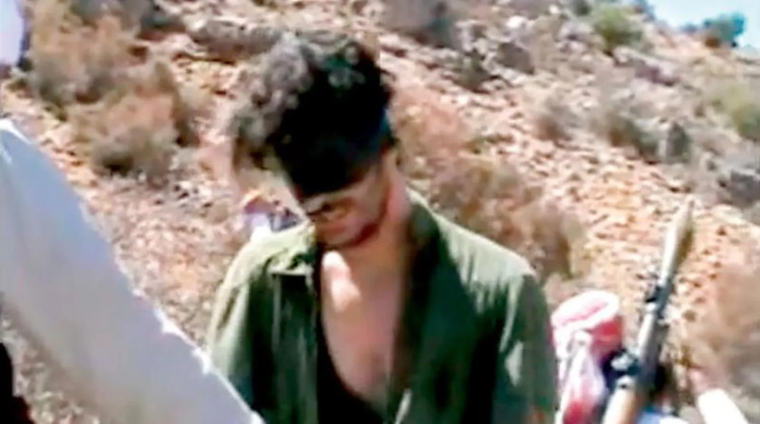 Austin Tice as he appeared in undated video posted to YouTube in 2012 seen blindfolded in the presence of gunmen. (AP) 