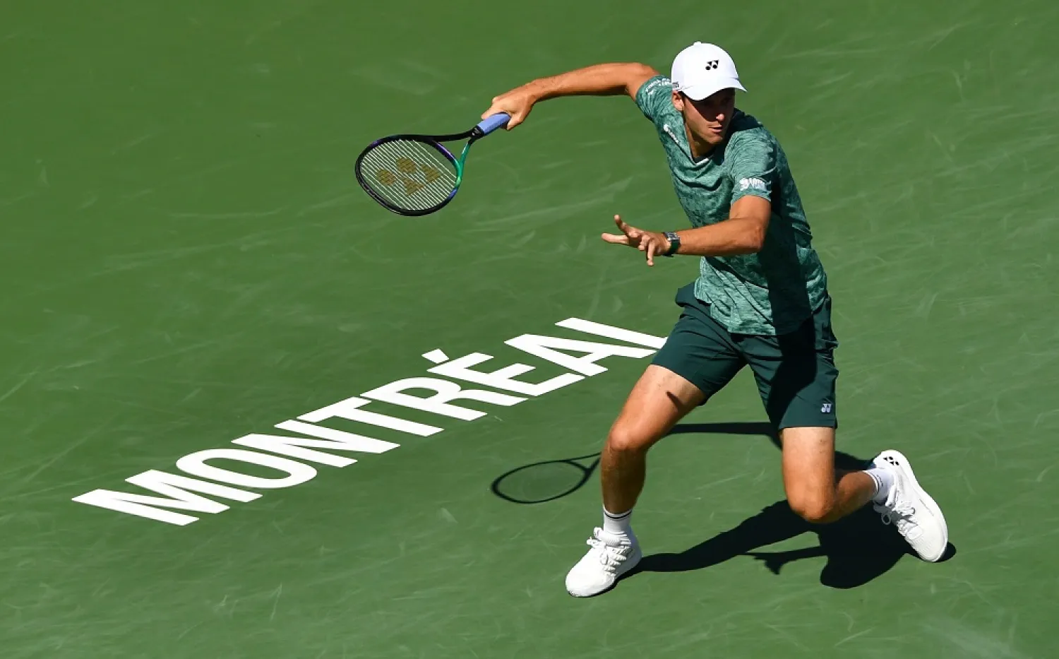 Hubert Hurkacz of Poland prepares to hit a return against Casper Ruud of Norway in the semifinals during Day 8 of the National Bank Open at Stade IGA on August 13, 2022 in Montreal, Canada. (Getty Images/AFP)