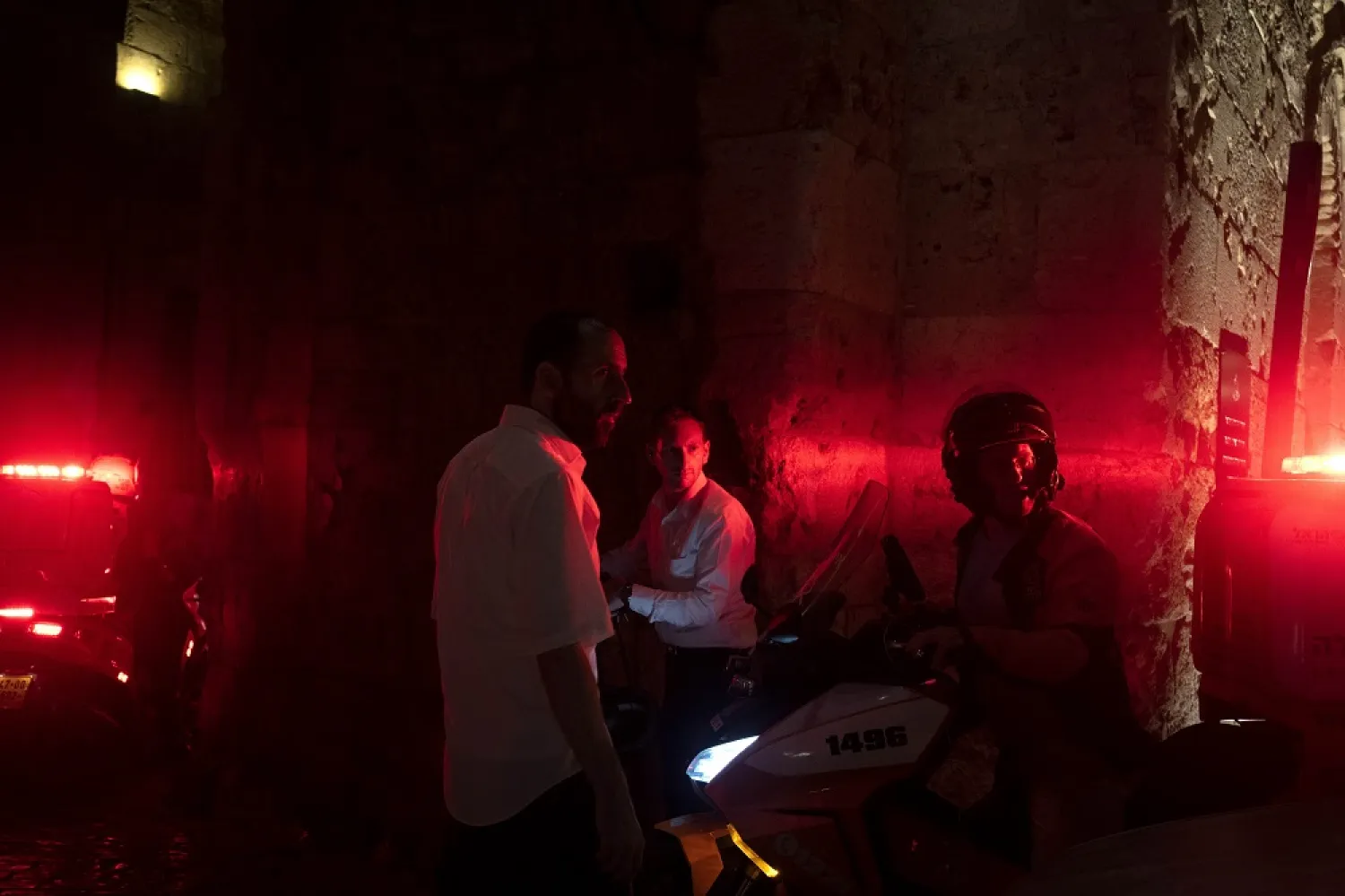 Paramedics on motorbikes who responded to a shooting attack that wounded several Israelis near the Old City of Jerusalem, early Sunday, Aug. 14, 2022. (AP)
