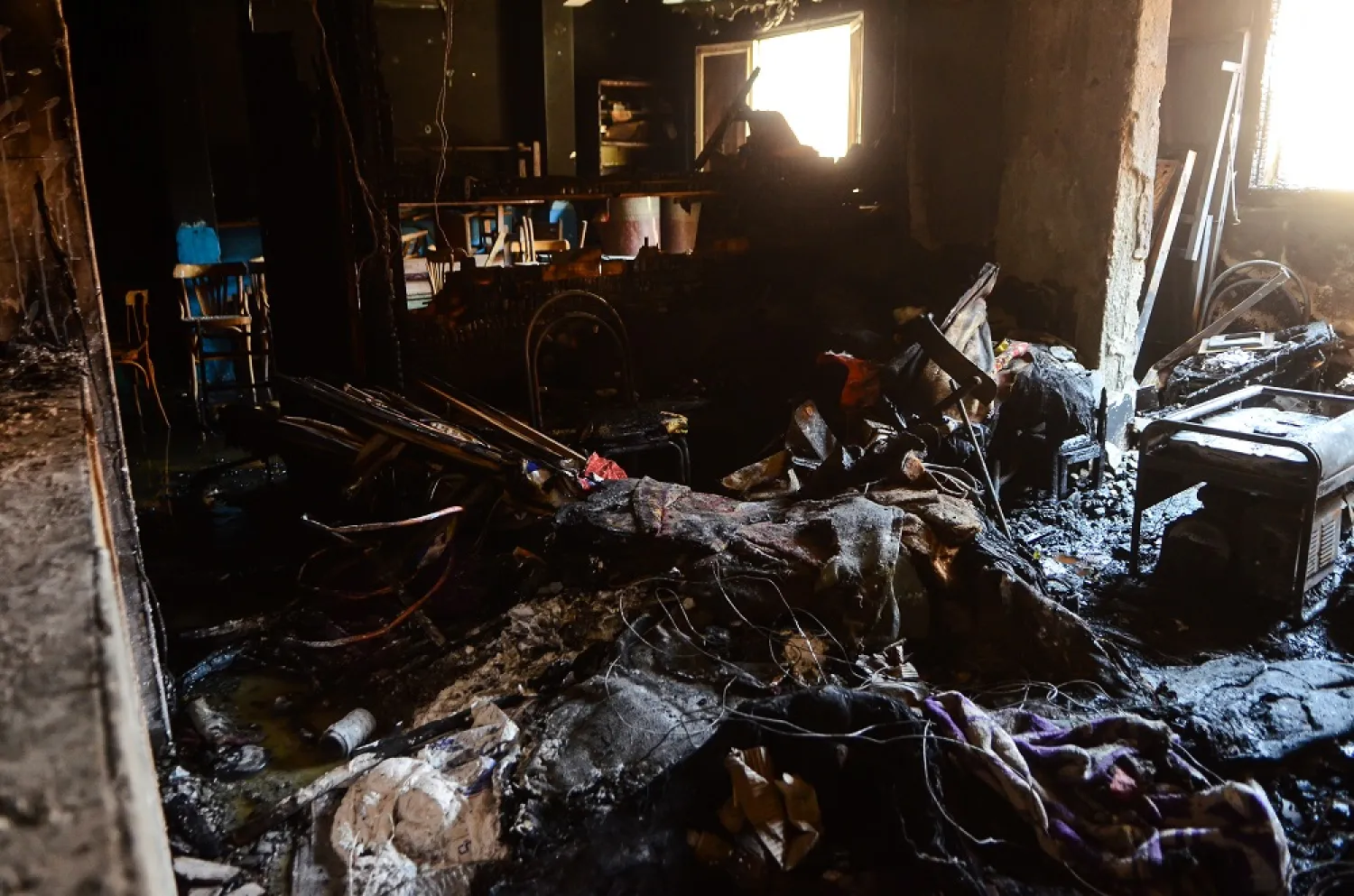 14 August 2022, Egypt, Giza: A view of the damage inside the Abu Sifin Coptic church in Giza, after a massive fire broke out during a Sunday service. At least 41 people have died and several were seriously injured after a mass fire broke out at the Coptic church. (dpa)