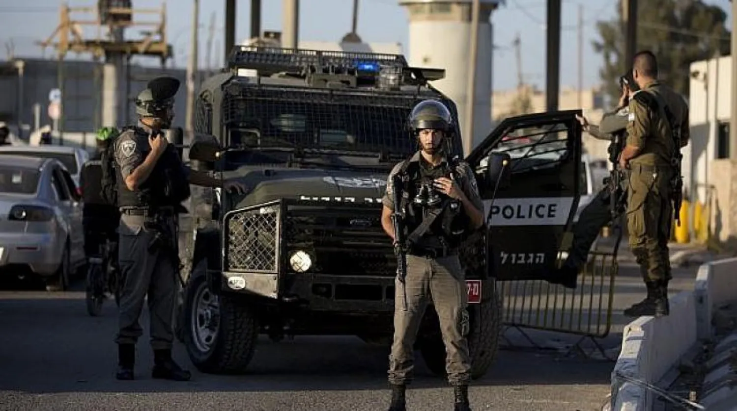 Illustrative: Border Police officers deploy at the Qalandiya checkpoint north of Jerusalem after an apparent stabbing attack, September 18, 2019. (AP Photo/Majdi Mohammed)

