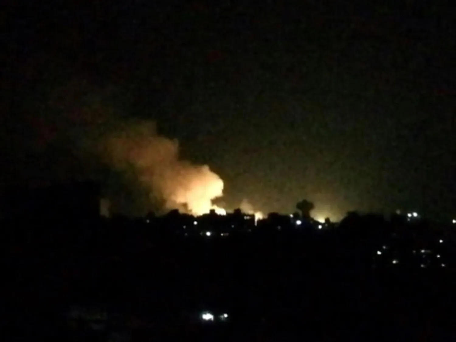  Smoke billows from buildings near Damascus after an Israeli attack during the night of July 1, 2019. (AFP)
