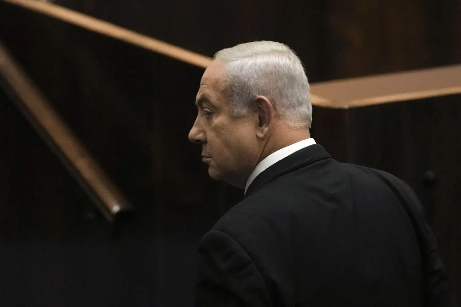 Former Israeli Prime Minister Benjamin Netanyahu awaits the vote on a bill to dissolve parliament, the Knesset, Israel's parliament, in Jerusalem, Thursday, June 30, 2022. (AP)