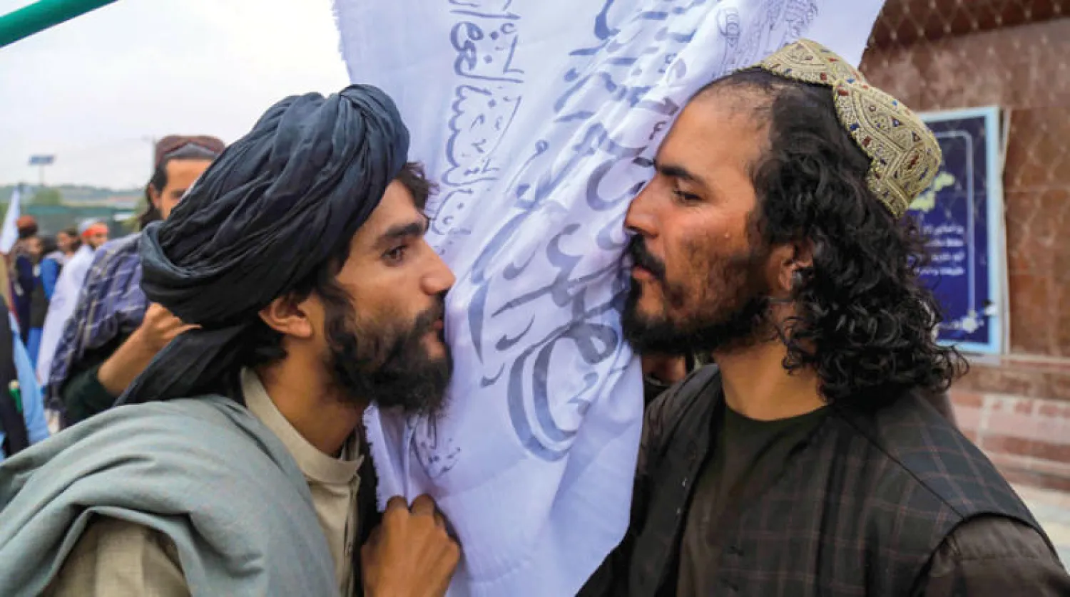 احتفالات عناصر «طالبان» بالذكري السنوية الأولى لسيطرتهم على كابل (إ.ب.أ)