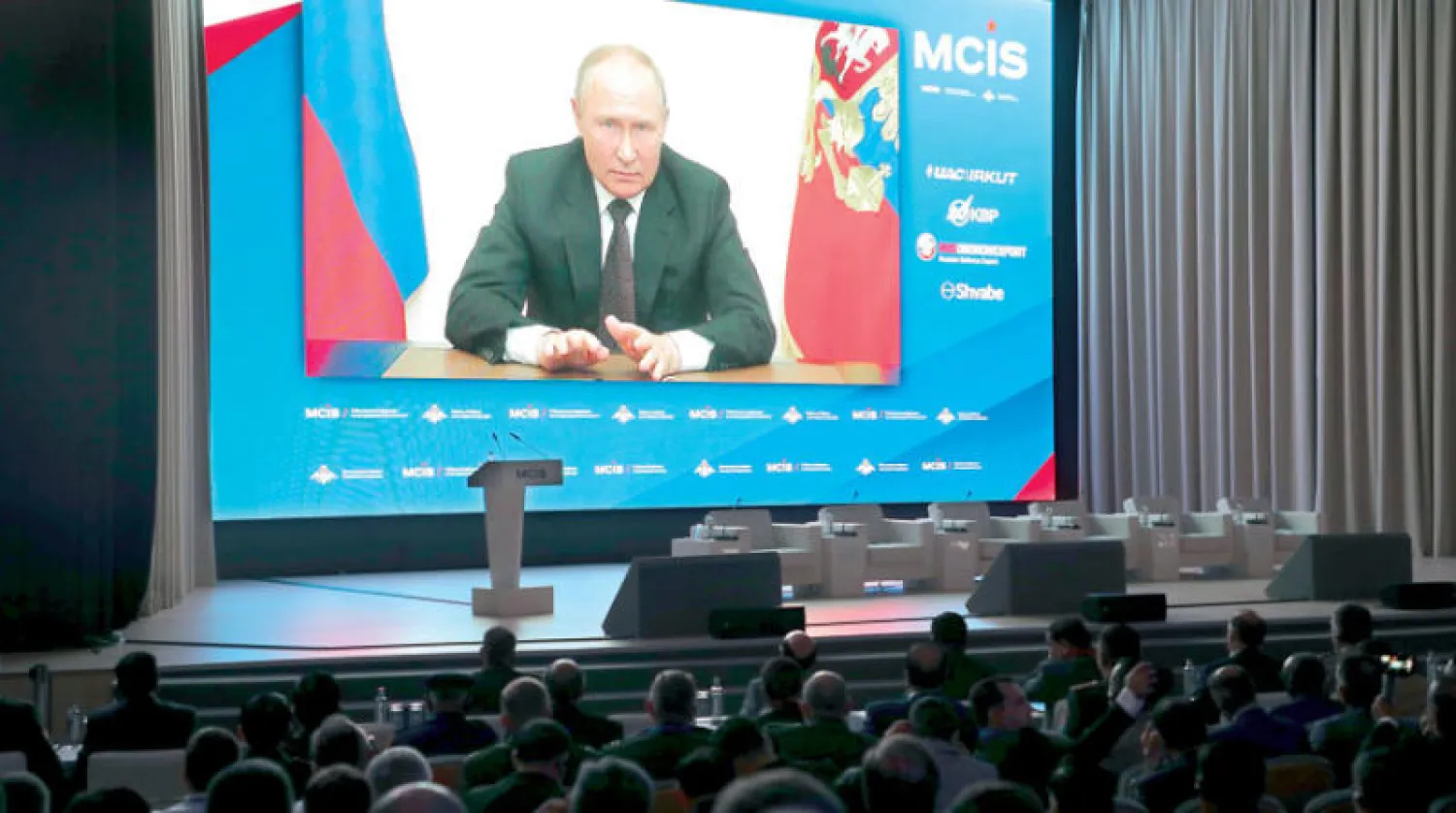 بوتين خلال حديثه أمس عبر الفيديو (إ.ب.أ)