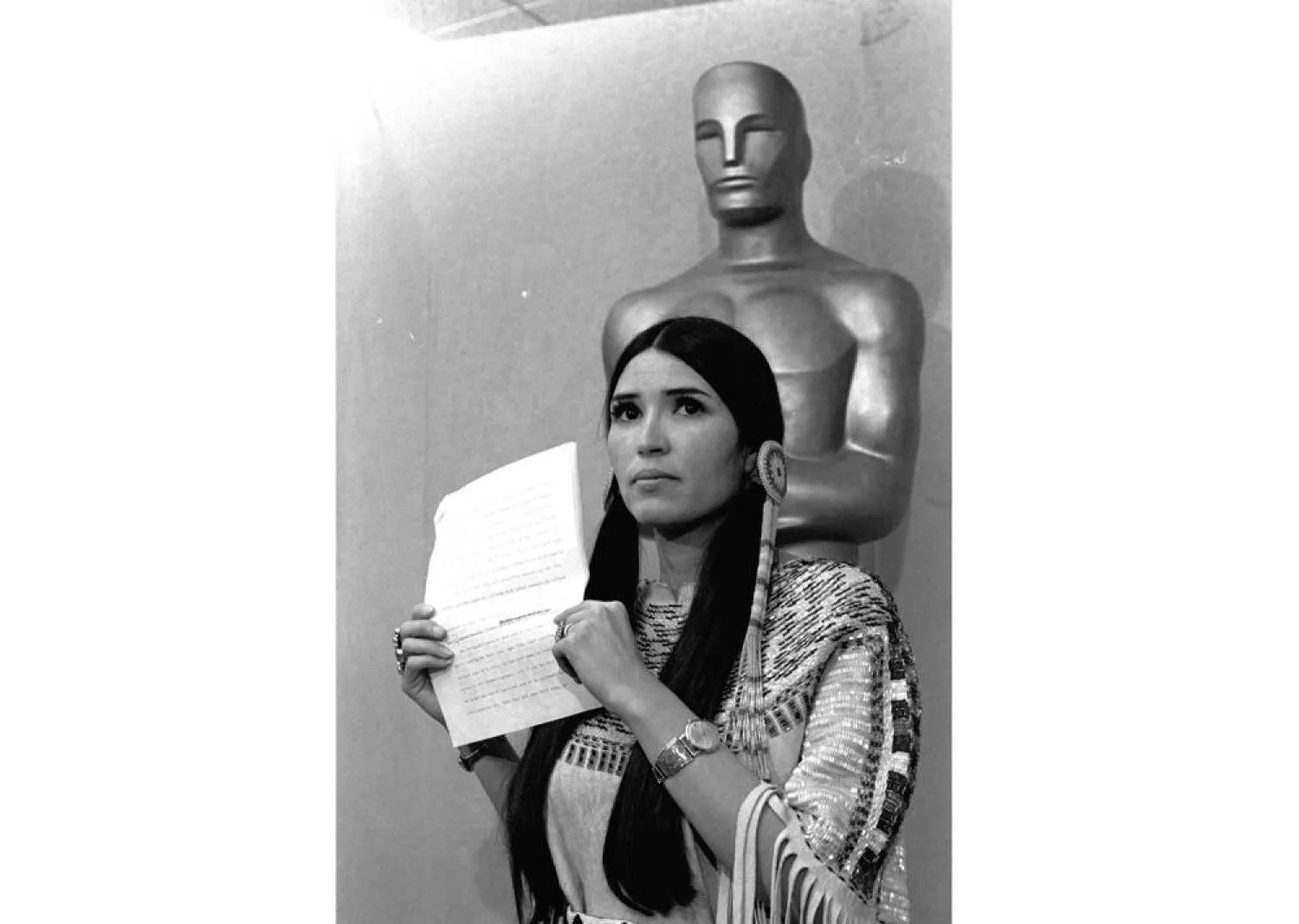 Sacheen Littlefeather appears at the Academy Awards ceremony to announce that Marlon Brando was declining his Oscar as best actor for his role in "The Godfather," on March 27, 1973. (AP)