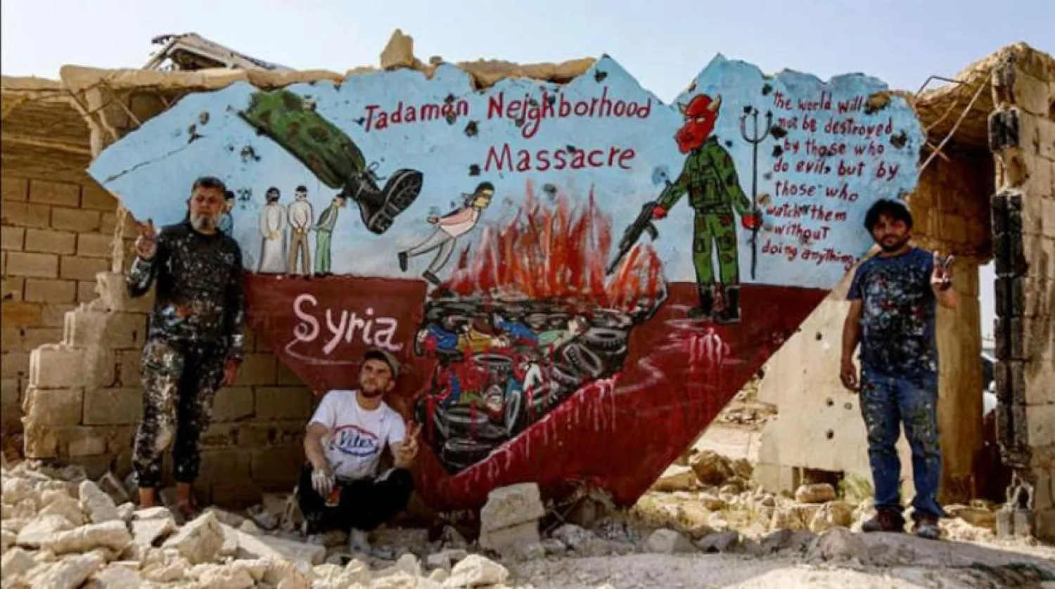 A mural in northwestern Syria shows the regime's massacre in Tadamon. (Opposition social media)
