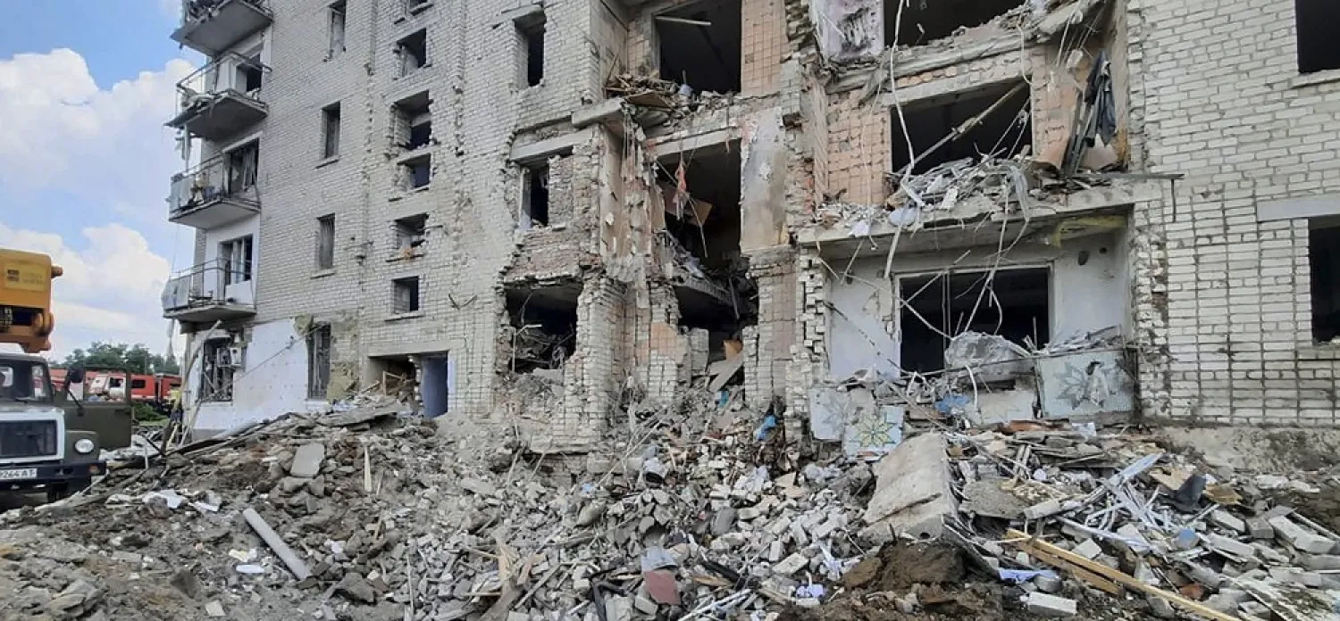 A handout picture made available by Mykolaiv Region Prosecutor's Office shows a residential building damaged in shelling at the city of Voznesensk of Mykolaiv area, Ukraine, 20 August 2022, amid the Russian invasion. (EPA/Mykolaiv Region Prosecutor's Office)