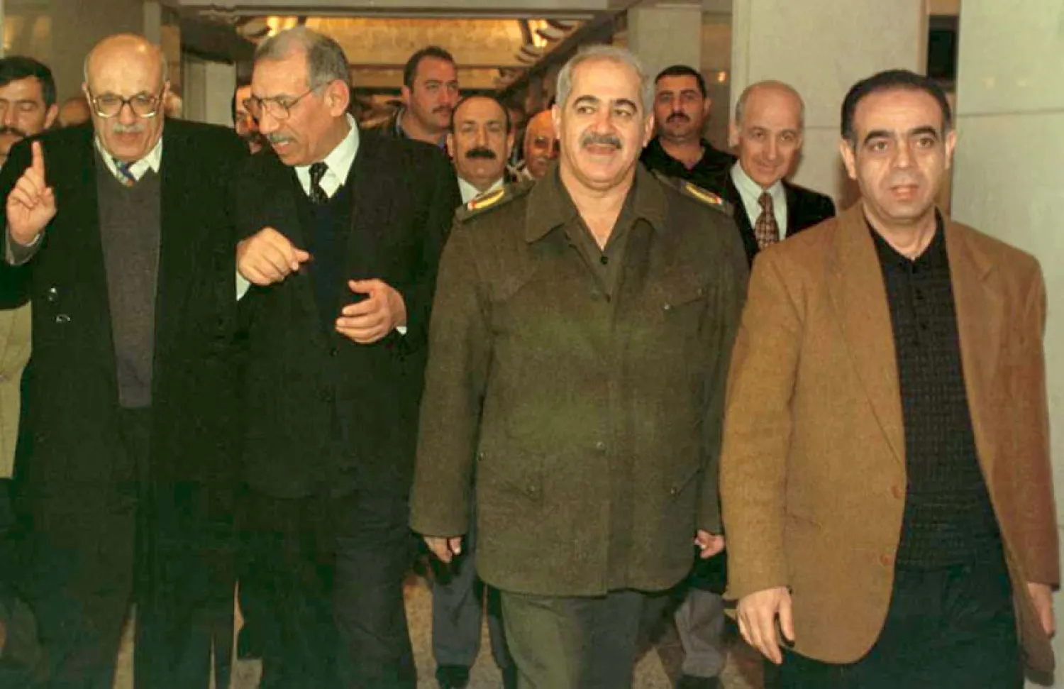 Al-Rawi with Iraqi and Jordanian officials in Baghdad in 2000 (Getty Images)

