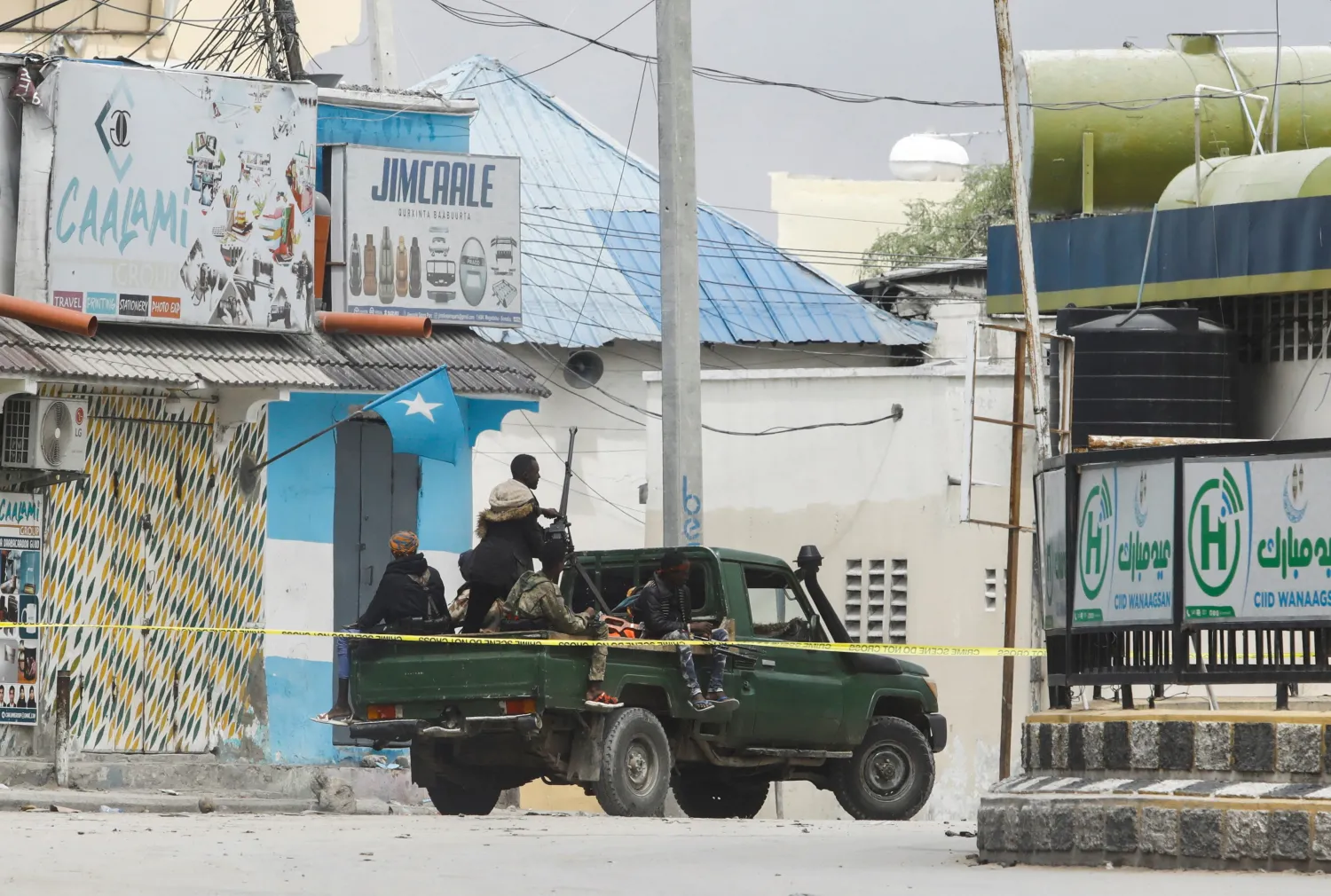 Somali security officers are seen at a section of Hotel Hayat, the scene of an al Qaeda-linked al Shabaab group militant attack in Mogadishu, Somalia August 20, 2022. REUTERS/Feisal Omar