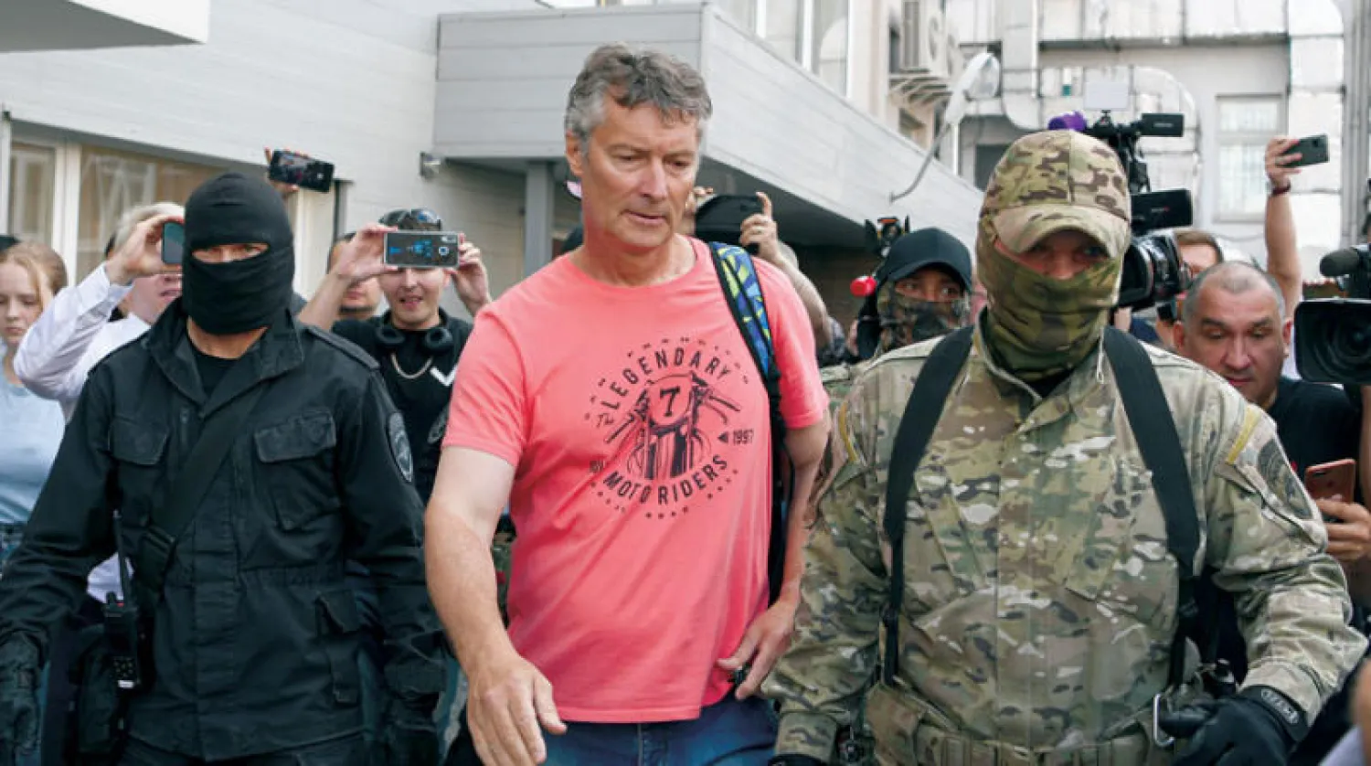 يفغيني رويزمان خلال اعتقاله الأربعاء (د.ب.أ)