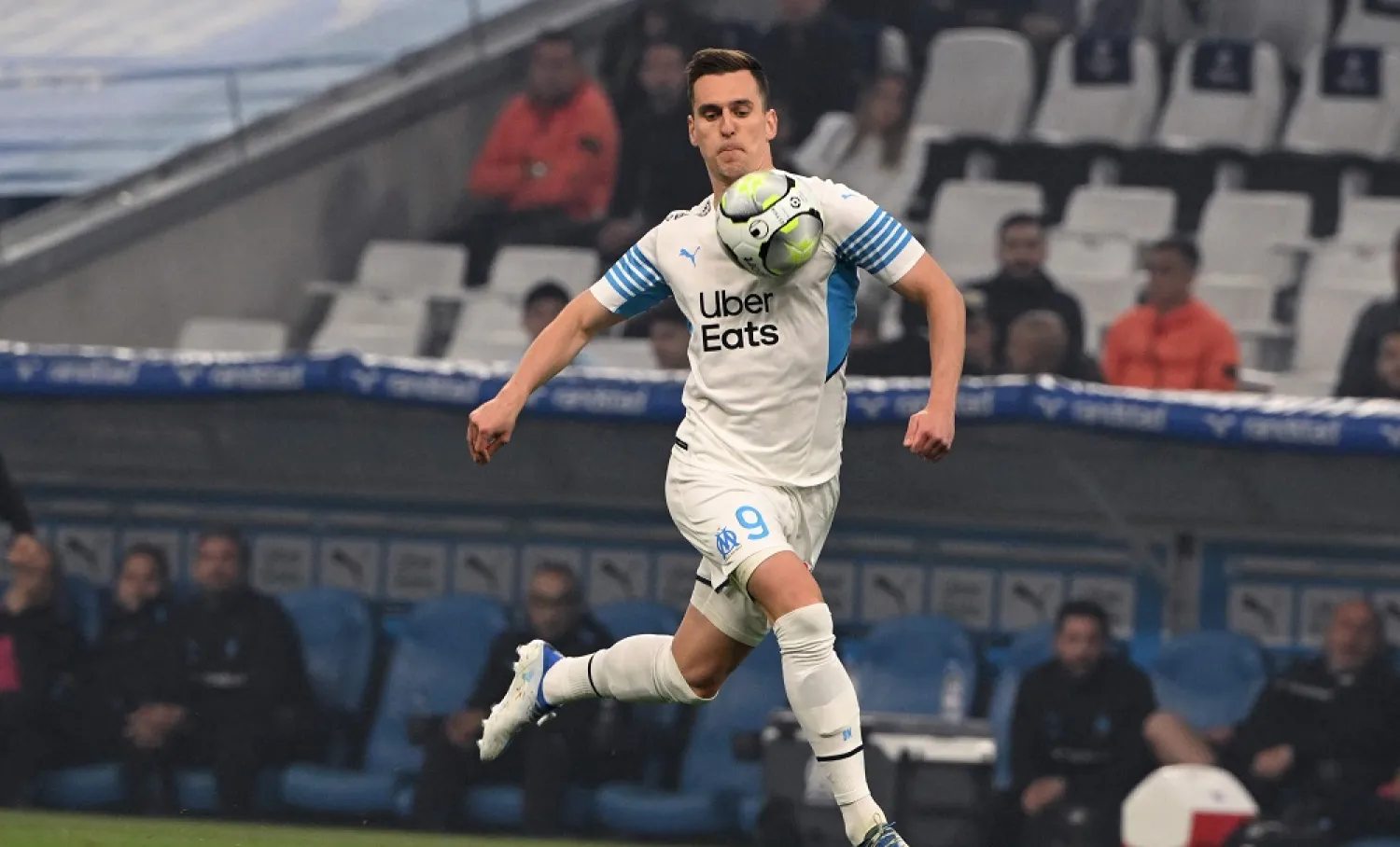 In this file photo taken on May 01, 2022 Marseille's Poland's forward Arkadiusz Milik controls the ball during the French L1 football match between Olympique Marseille (OM) and Olympique Lyonnais at Stade Velodrome in Marseille, southern France. (AFP)