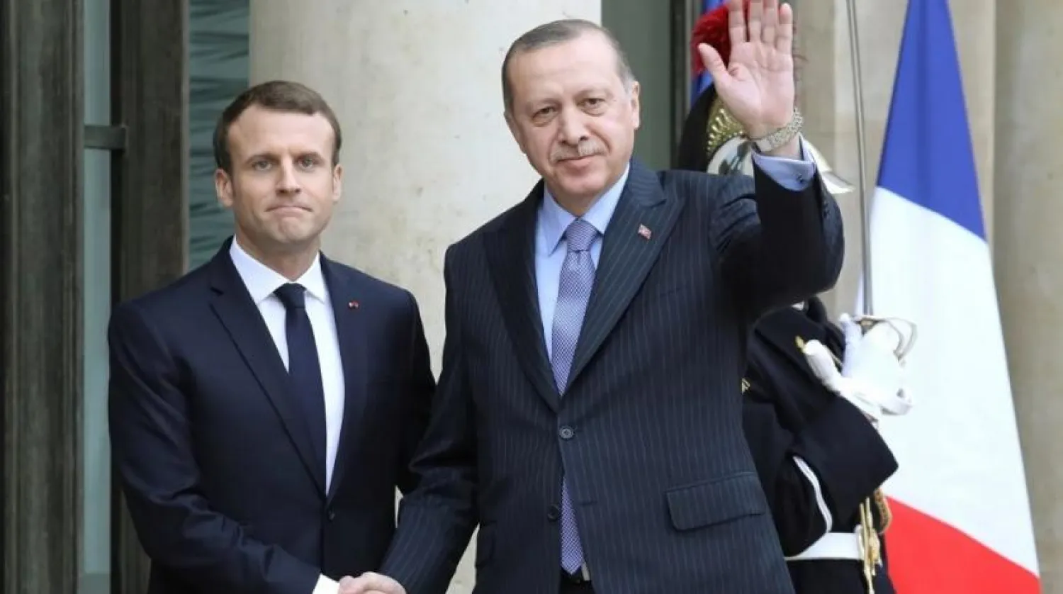 File Photo: French President Emmanuel Macron (L) with his Turkish counterpart Recep Tayyip Erdogan at the Elysee Palace in Paris in 2018. (AFP)
