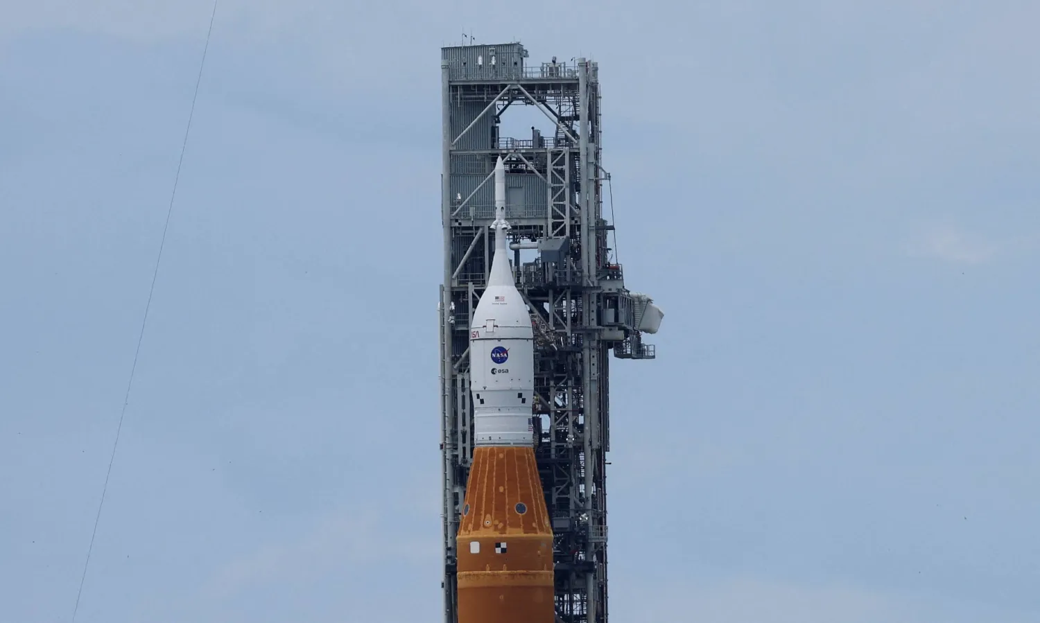 NASA's next-generation moon rocket, the Space Launch System (SLS) rocket, stands on launch pad 39B in preparation for the unmanned Artemis 1 mission at Cape Canaveral, Florida, on Sunday. | REUTERS
