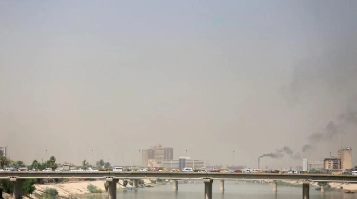 Normal traffic on a Baghdad bridge (AFP)
