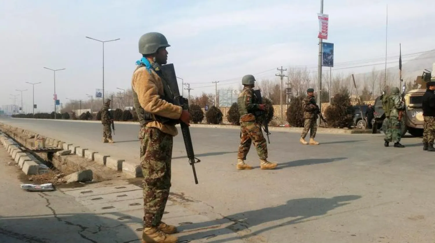 Afghan security forces keep watch at the site of an attack in Kabul, Afghanistan December 18 ,2017. REUTERS/Omar Sobhani
