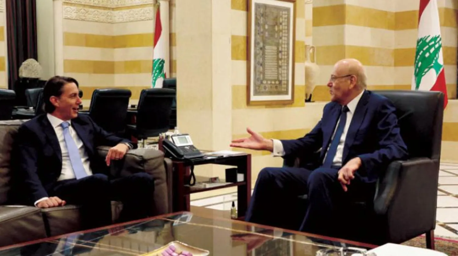  Prime Minister Najib Mikati talks with US mediator Amos Hochstein during a recent visit to Beirut. (Reuters)