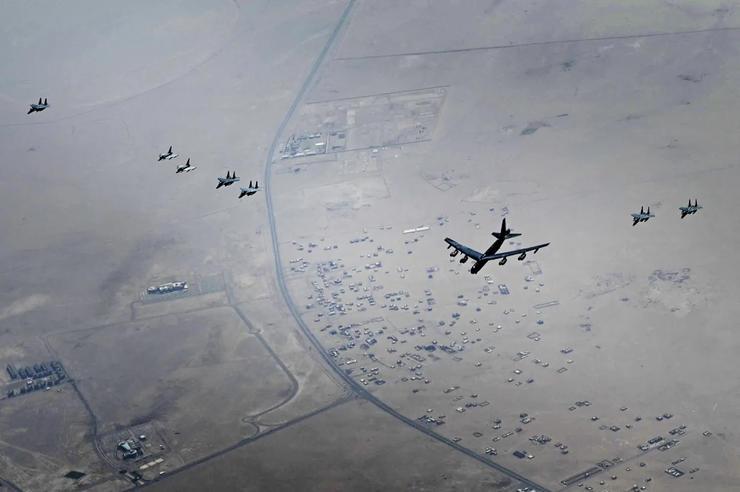 This photo released by the U.S. Air Force shows a B-52H Stratofortress assigned to the 5th Bomb Wing, Minot Air Force Base, North Dakota, flying over the Middle East on Sunday, Sept. 4, 2022. (US Air Force via AP)