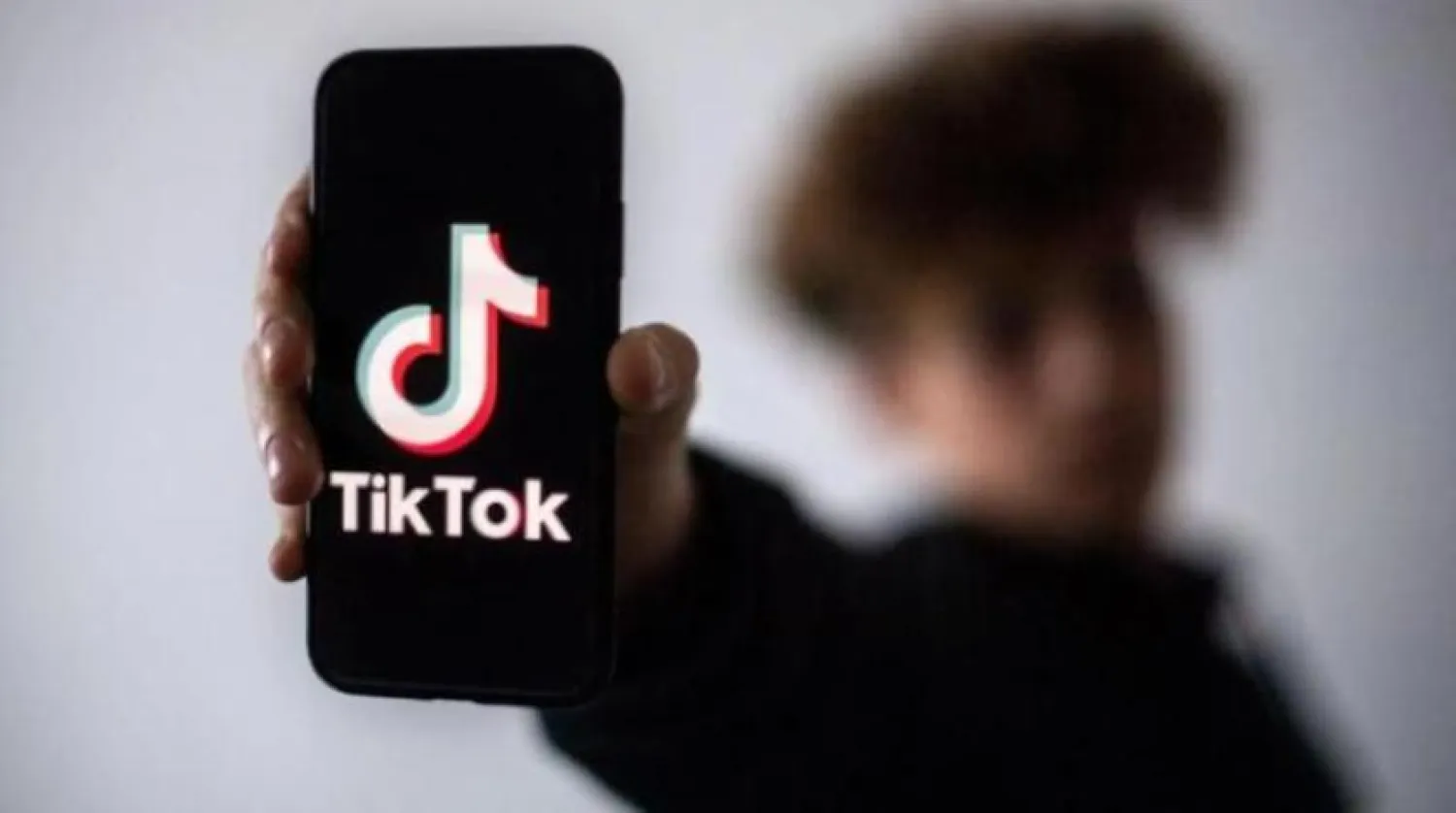 Akıllı telefondaki TikTok uygulamasının logosu (AFP)