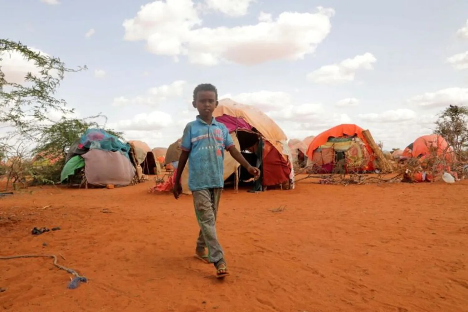 FILE PHOTO: Abdulahi Hassan, 3, walks at the Kaxareey camp for the internally displaced people in Dollow, Gedo region of Somalia May 24, 2022. Picture taken May 24, 2022. REUTERS/Feisal Omar/File PhotoREUTERS

