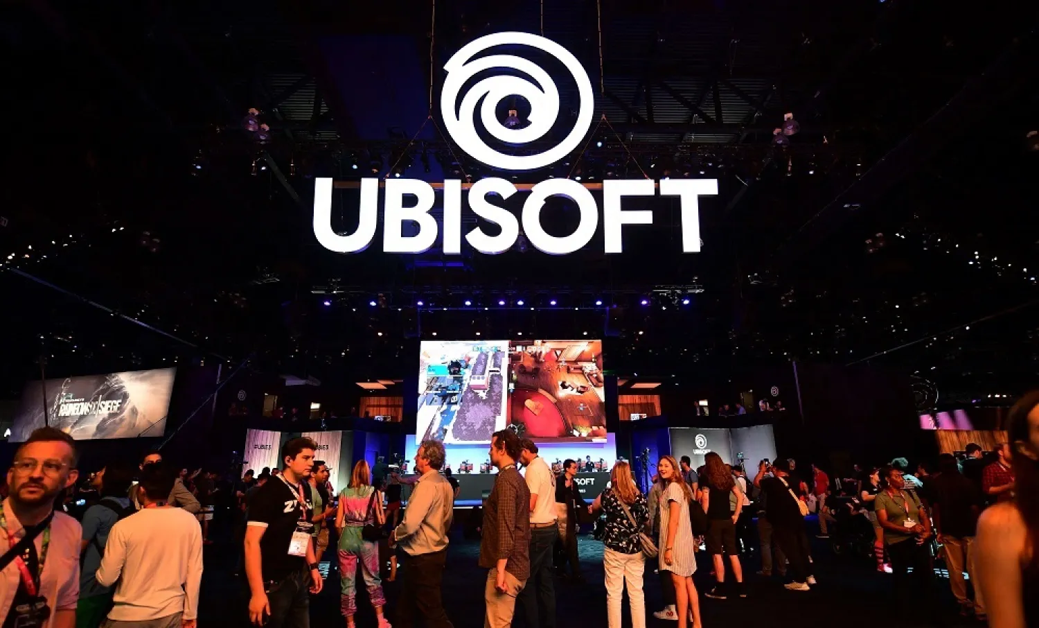 In this file photo taken on June 11, 2019 gaming fans play Ubisoft games at the 2019 Electronic Entertainment Expo, also known as E3, opening in Los Angeles, California. (AFP)