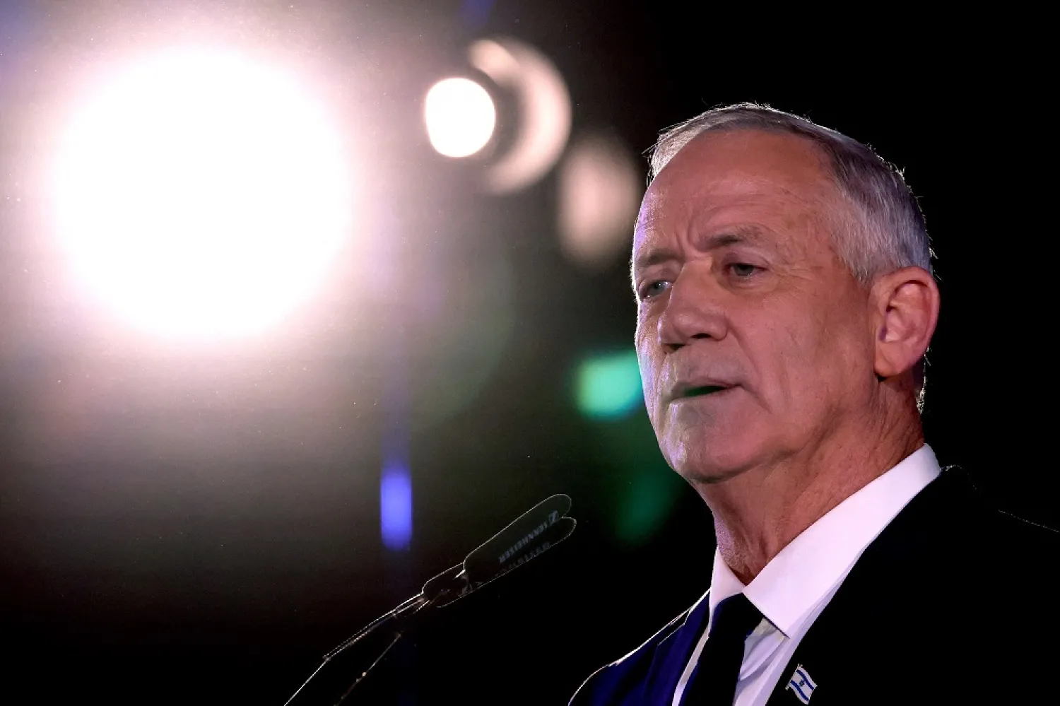 Benny Gantz, Israeli Defense Minister and leader of the National Unity Party political alliance, speaks during a political rally in the coastal city of Tel Aviv on September 6, 2022, to announce the candidates for the upcoming parliamentary elections. (AFP)