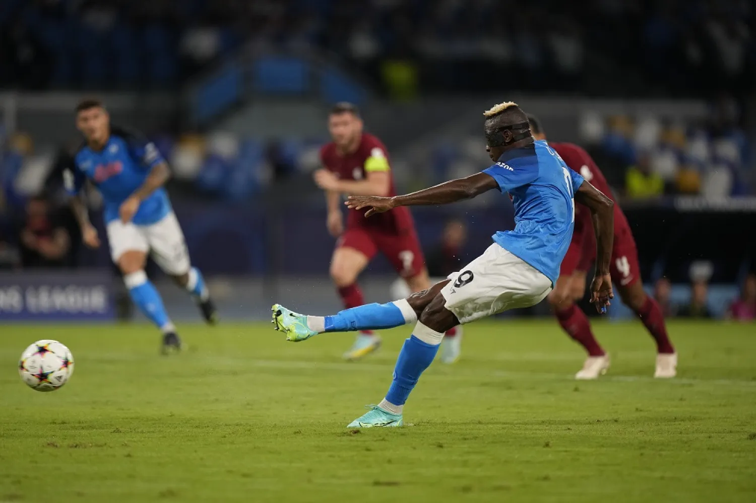 Napoli's Victor Osimhen fails to score from a penalty kick during the group A Champions League match between Napoli and Liverpool at the Diego Armando Maradona stadium in Naples, Italy, Wednesday, Sept. 7, 2022. (AP)