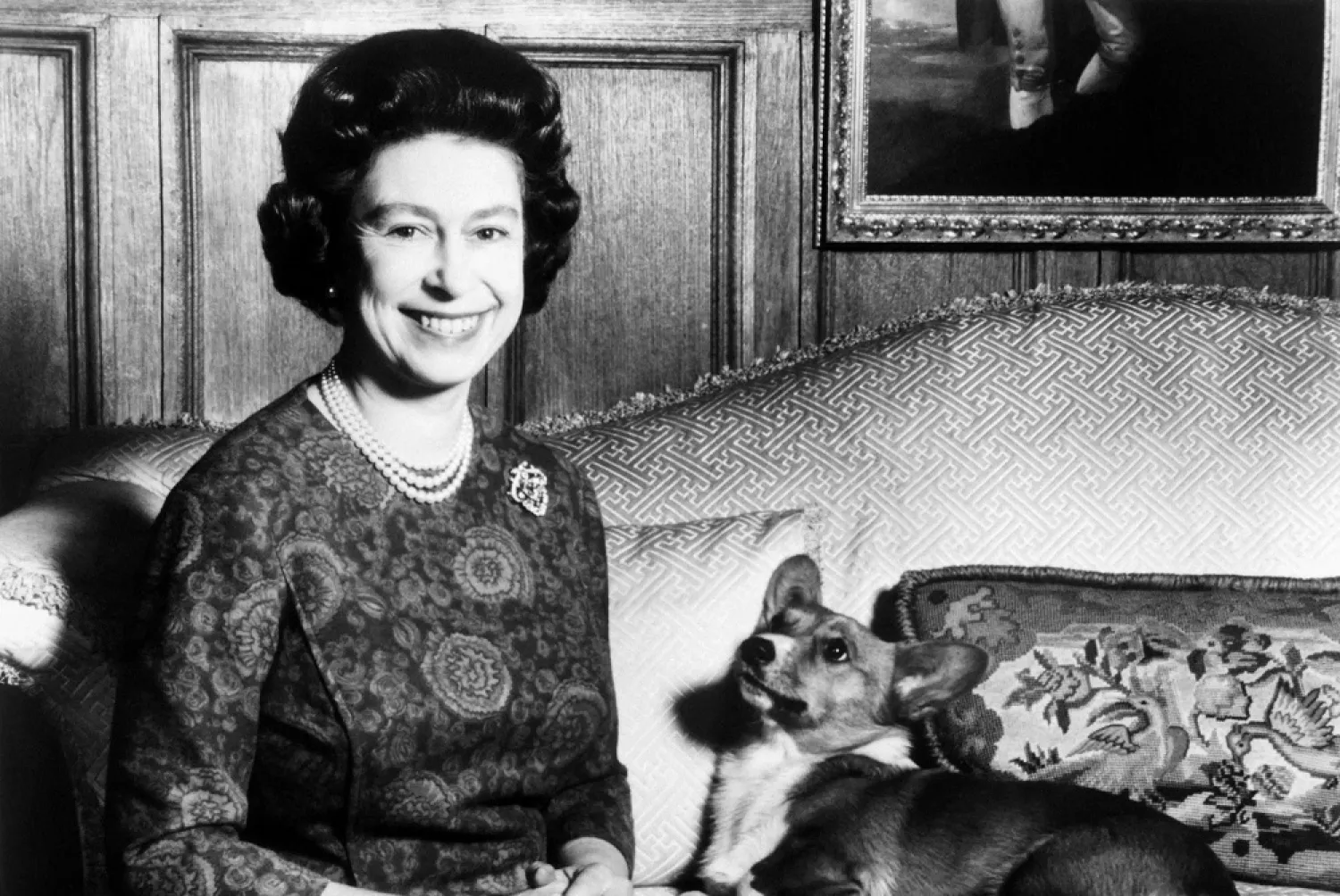 In this file photo taken on February 26, 1970 Queen Elizabeth II poses with her corgis dog. (AFP)