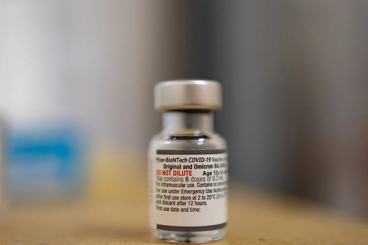 A vial of the Pfizer-BioNTech coronavirus disease (COVID-19) booster vaccine targeting BA.4 and BA.5 Omicron sub variants is pictured at Skippack Pharmacy in Schwenksville, Pennsylvania, US, September 8, 2022. (Reuters)