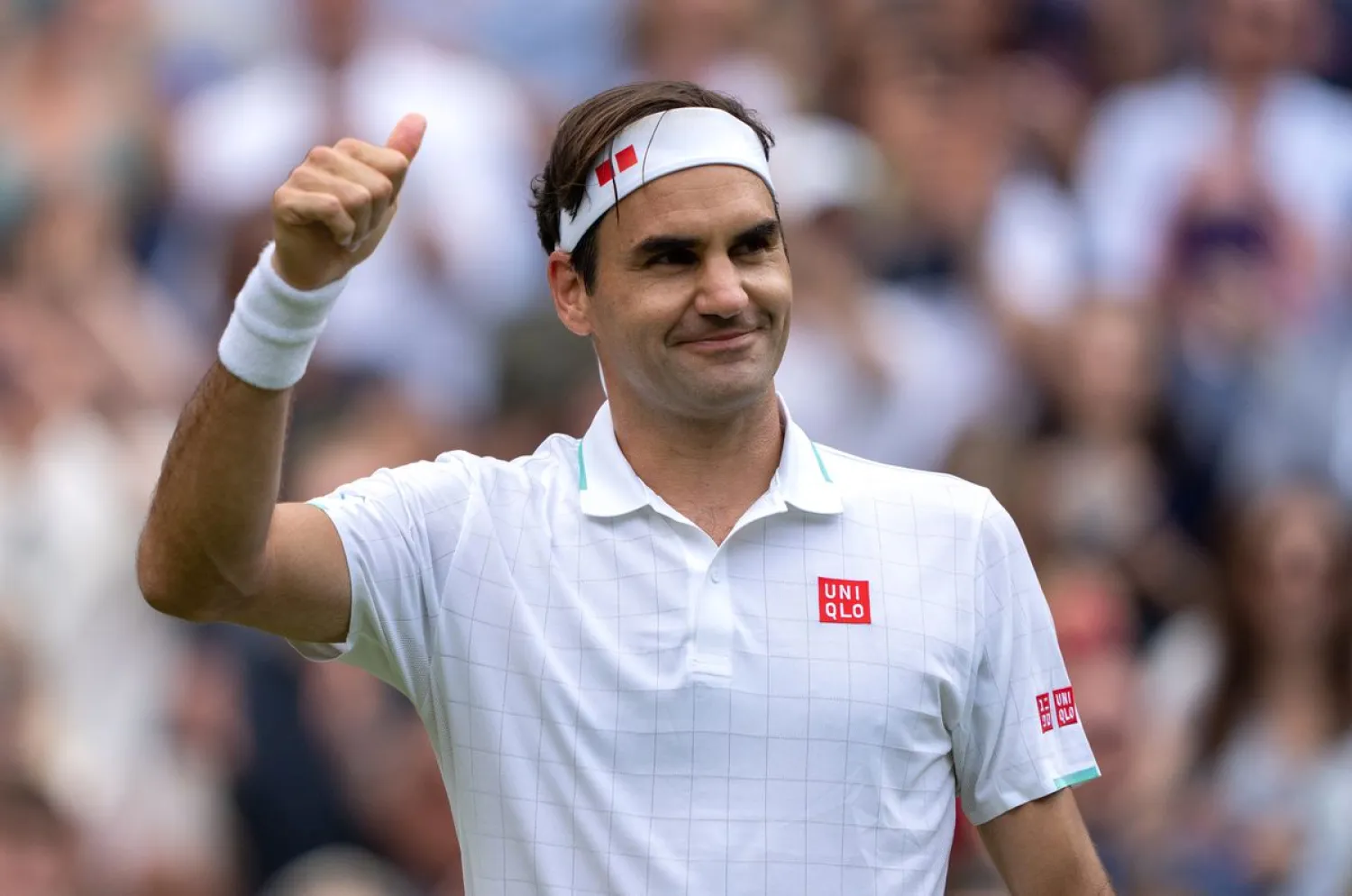 Tennis - Wimbledon - All England Lawn Tennis and Croquet Club, London, Britain - July 3, 2021 Switzerland's Roger Federer celebrates winning his third round match against Britain's Cameron Norrie Pool via REUTERS/Jed Leicester