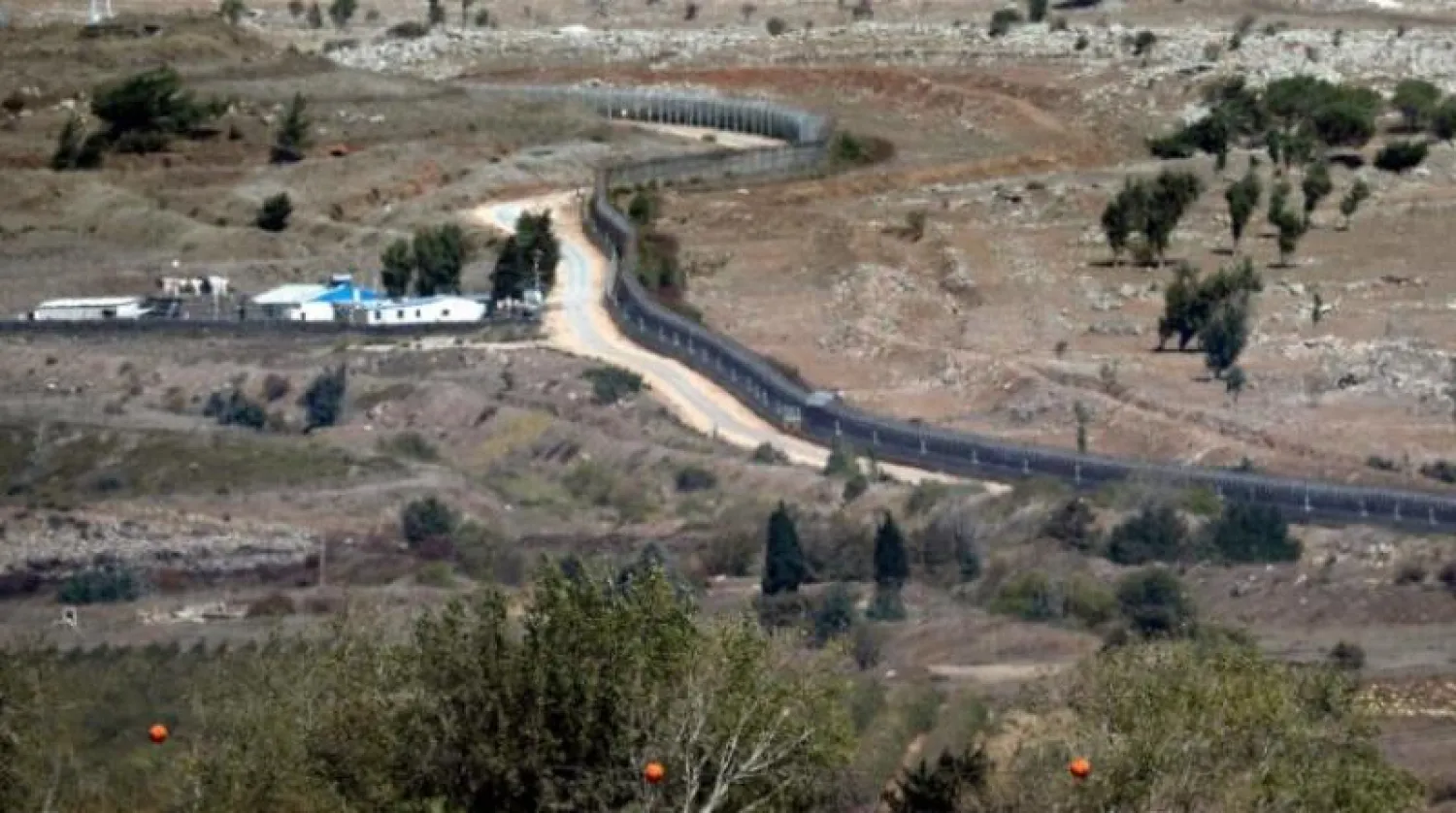 الحد الفاصل بين الأراضي السورية والقسم المحتل في هضبة الجولان (أ.ف.ب)