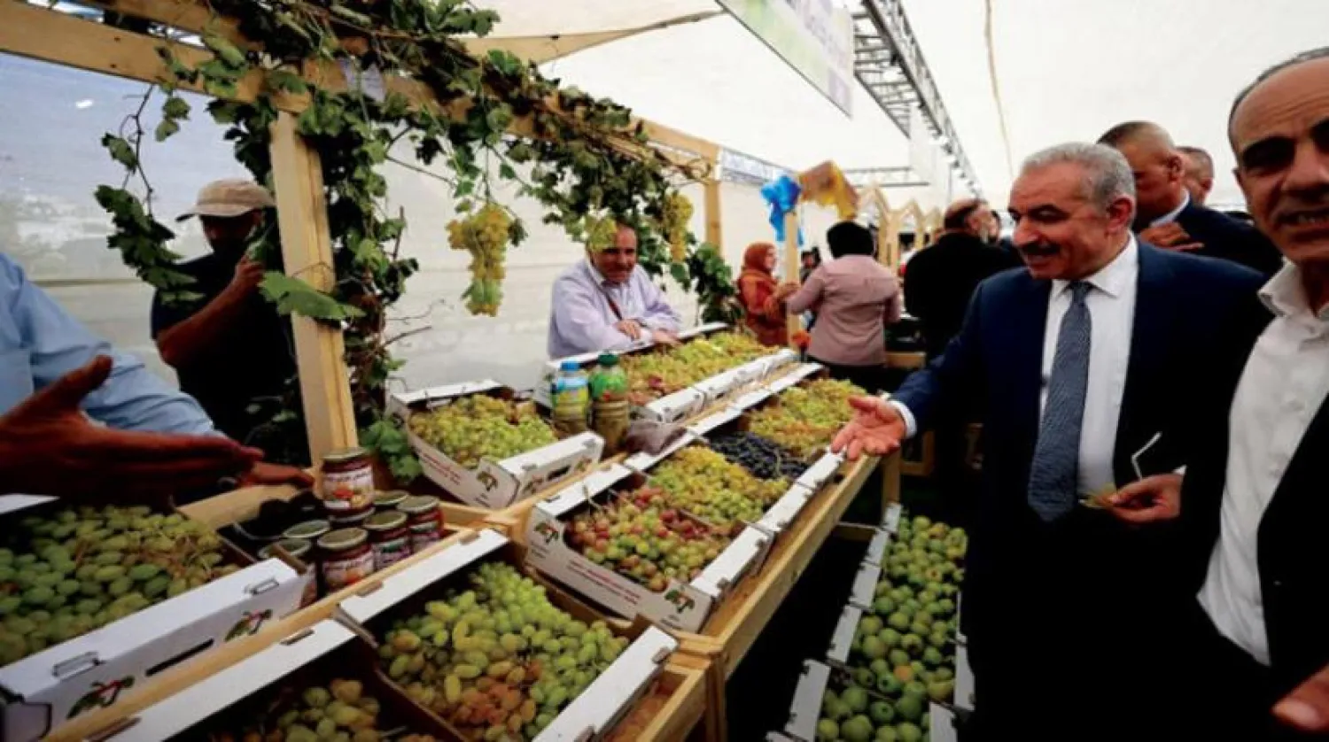 Prime Minister Mohammad Shtayyeh inaugurates the Ninth Grape Festival in Halhu (Wafa)