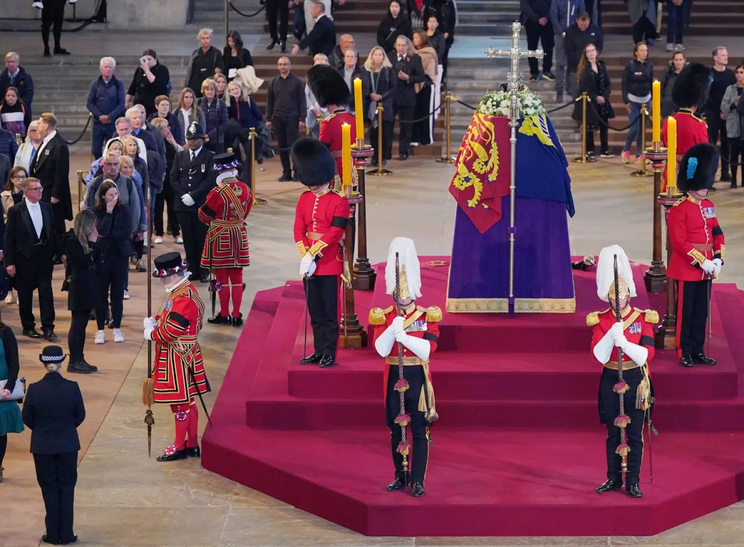 Members of the public file past the coffin of Queen Elizabeth II. Reuters