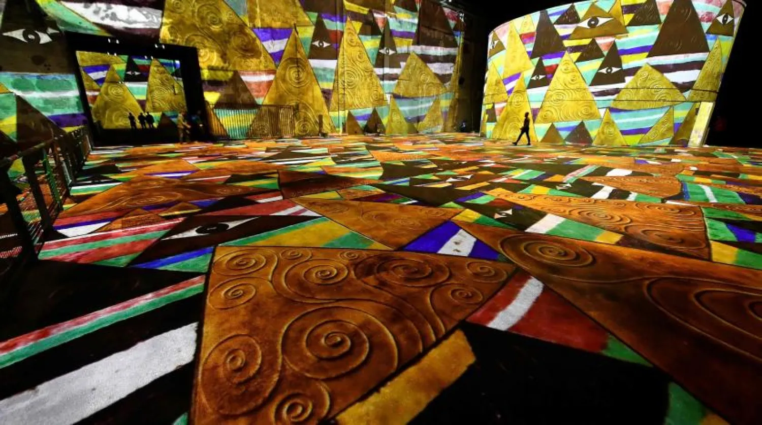 File Photo: A scene from the “Gustav Klimt: Gold and Color” show at “Bassins de Lumières” in Bordeaux, France, in June.Credit...Georges Gobet/Agence France-Presse — Getty Images
