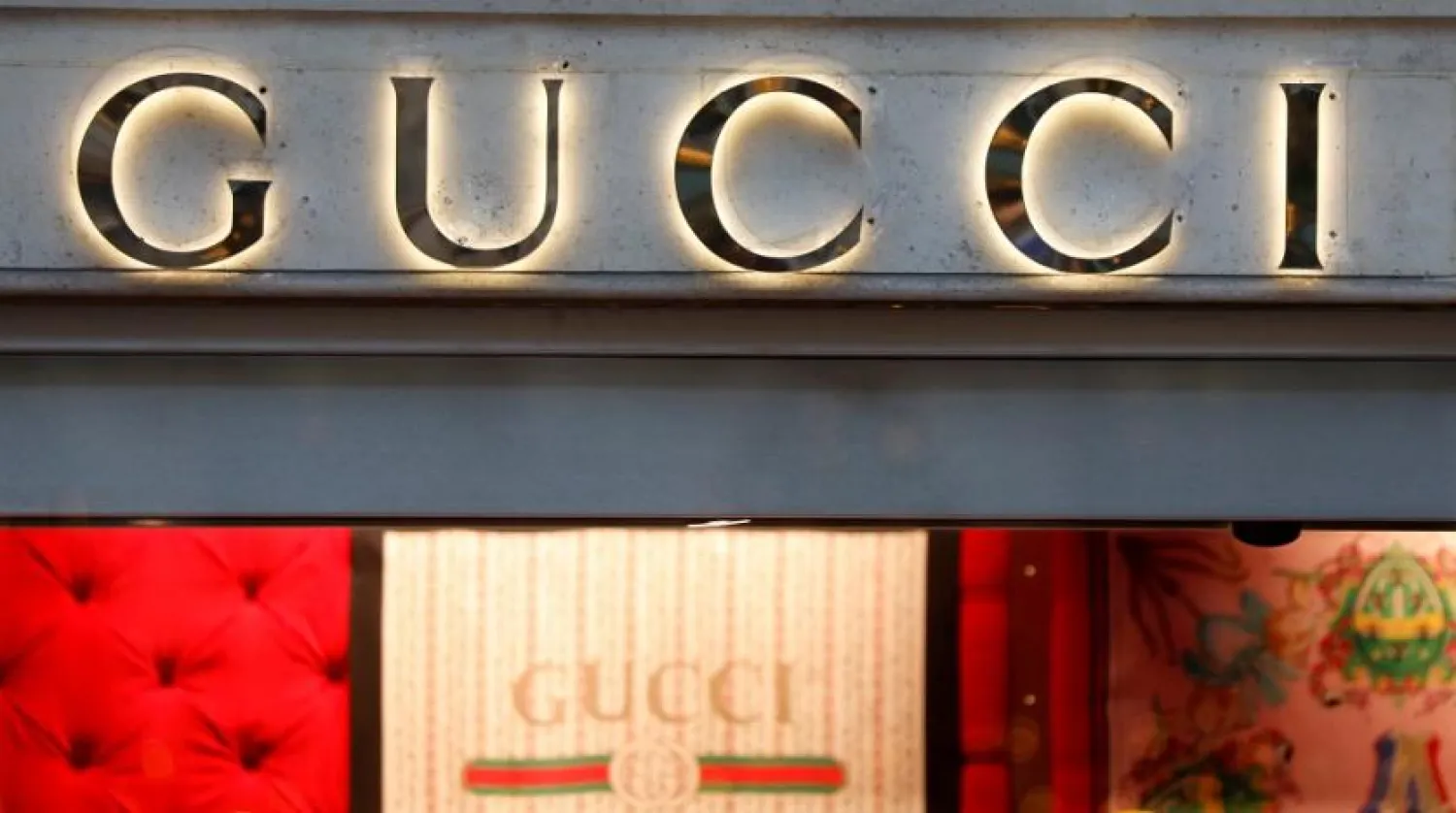 A Gucci sign is seen outside a shop in Paris, France, December 18, 2017. (Reuters)
