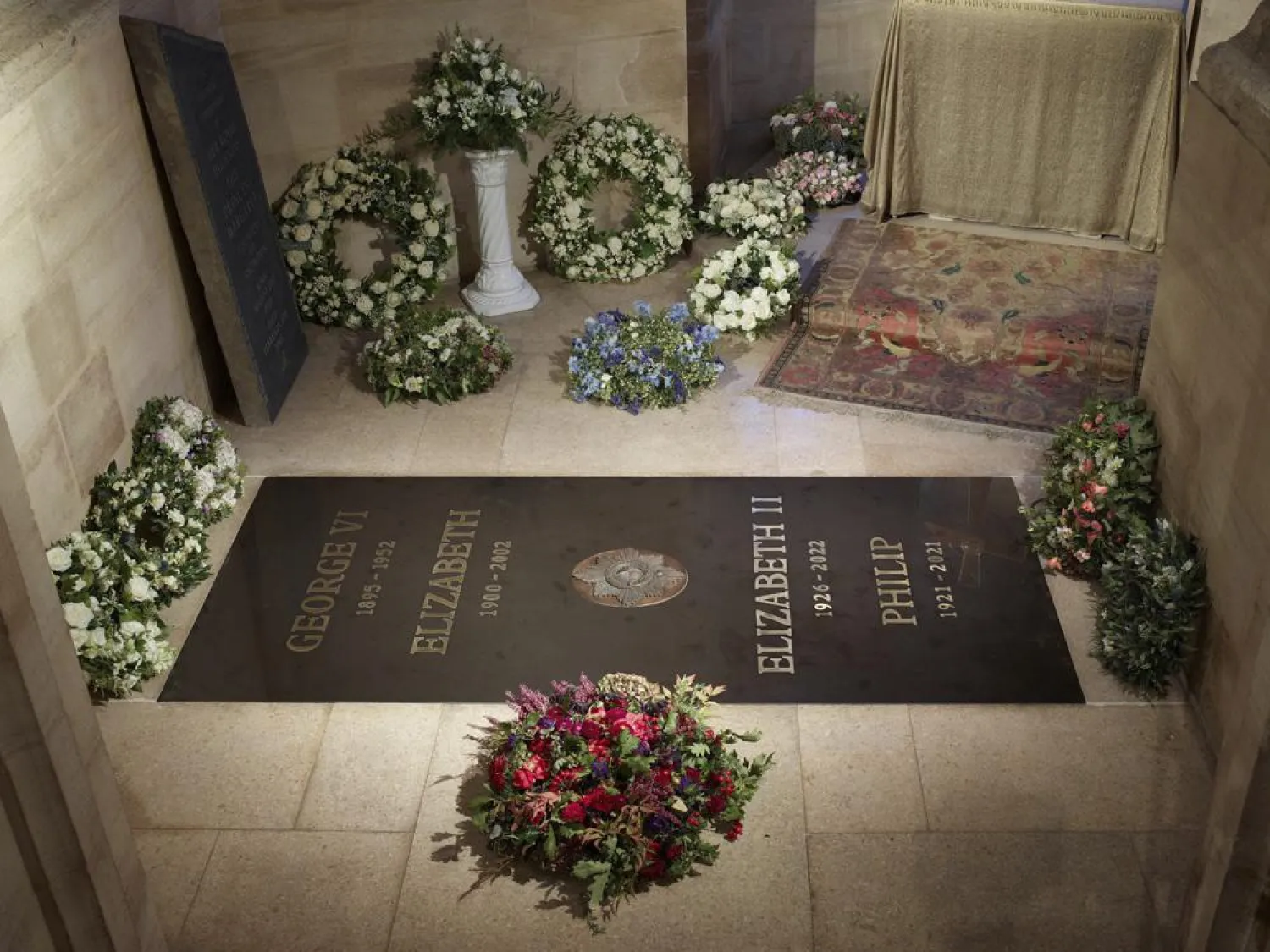 This photo provided by Buckingham Palace on Saturday Sept. 24, 2022 shows the ledger stone at the King George VI Memorial Chapel, St George's Chapel, Windsor Castle in Windsor, England. (Royal Collection Trust/The Dean and Canons of Windsor, PA via AP)