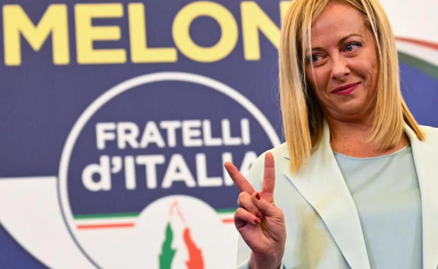 جورجيا ميلوني تحتفل بعد إعلان فوزها في الانتخابات التشريعية الإيطالية (أ.ف.ب)