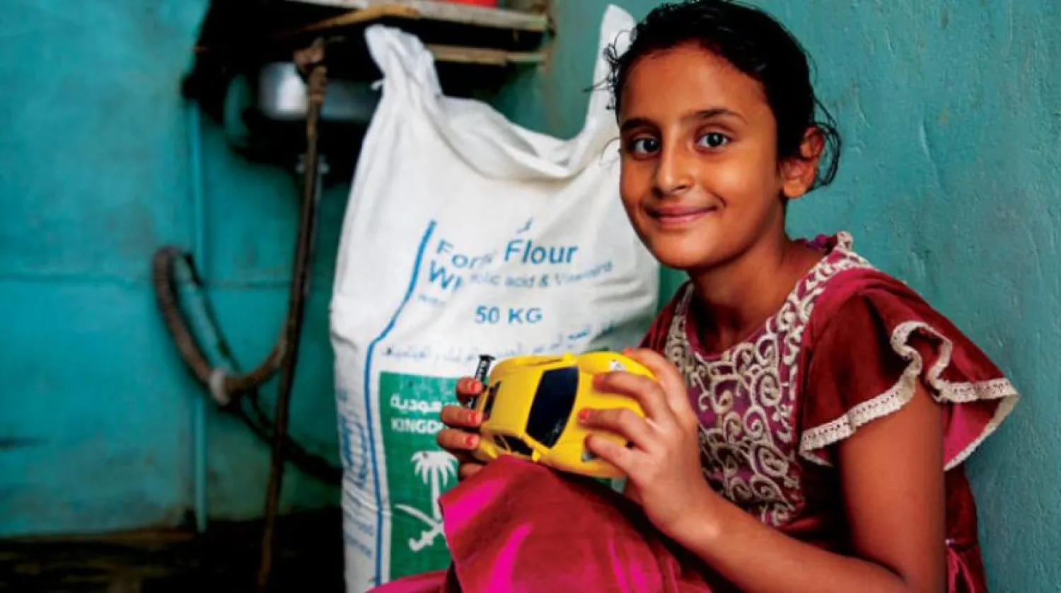A Yemeni girl whose family received food aid through the United Nations provided by the King Salman Humanitarian Aid and Relief Center (United Nations) 
