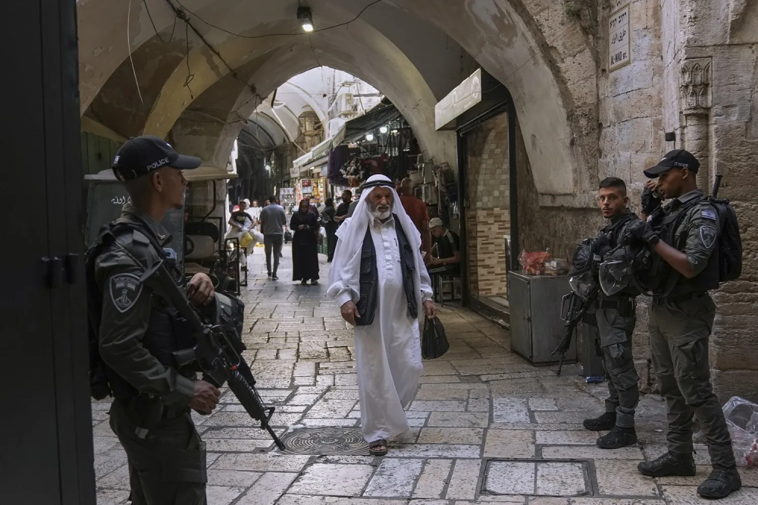 A Palestinian man walks in the Old City of Jerusalem, which is under heavy security during the Jewish new year, Tuesday, Sept. 27, 2022. (AP)
