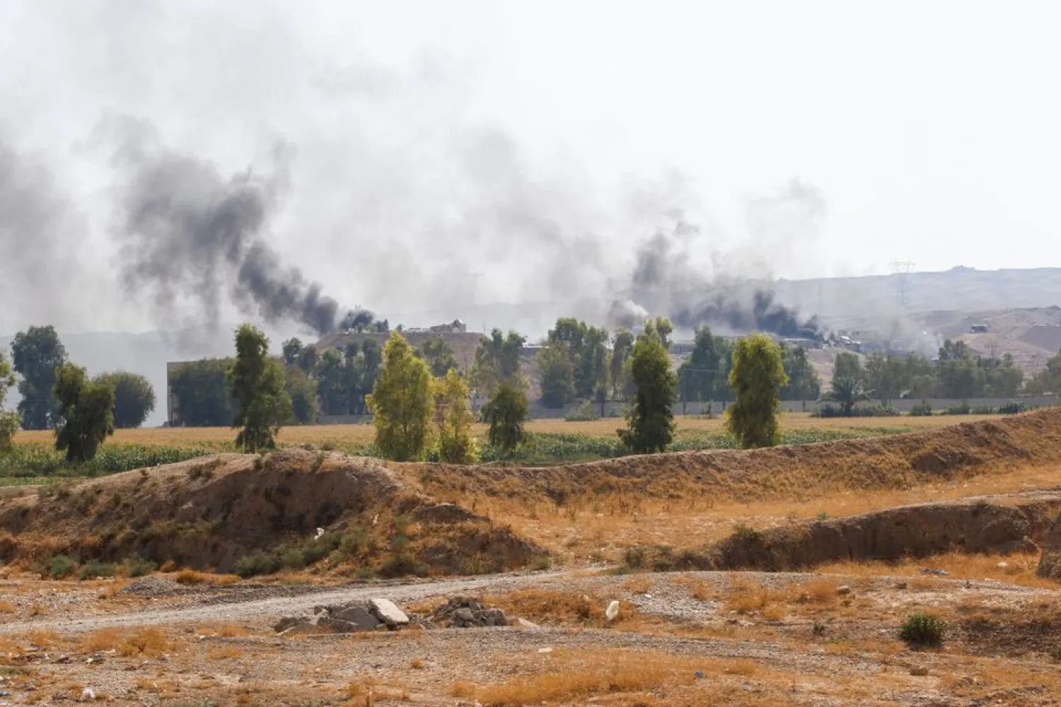 Smoke rises from the Iraqi Kurdistan headquarters of the Kurdish Democratic Party of Iran, after Iran's Revolutionary Guards' strike on the outskirts of Kirkuk, Iraq September 28, 2022. REUTERS/Ako Rasheed 