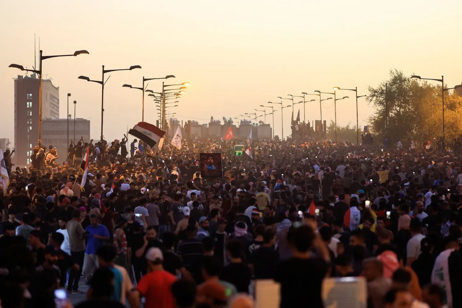 Iraqi protesters gather to mark the third anniversary of the anti-government protests in Baghdad, Iraq October 1, 2022. (Reuters)