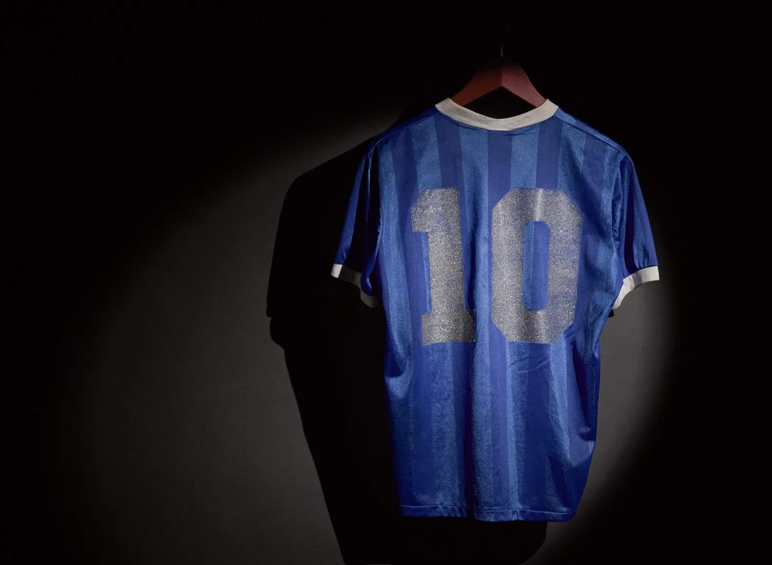 This undated handout shows the 1986 World Cup shirt Diego Maradona wore against England, New York, US. (AFP/Sotheby's)