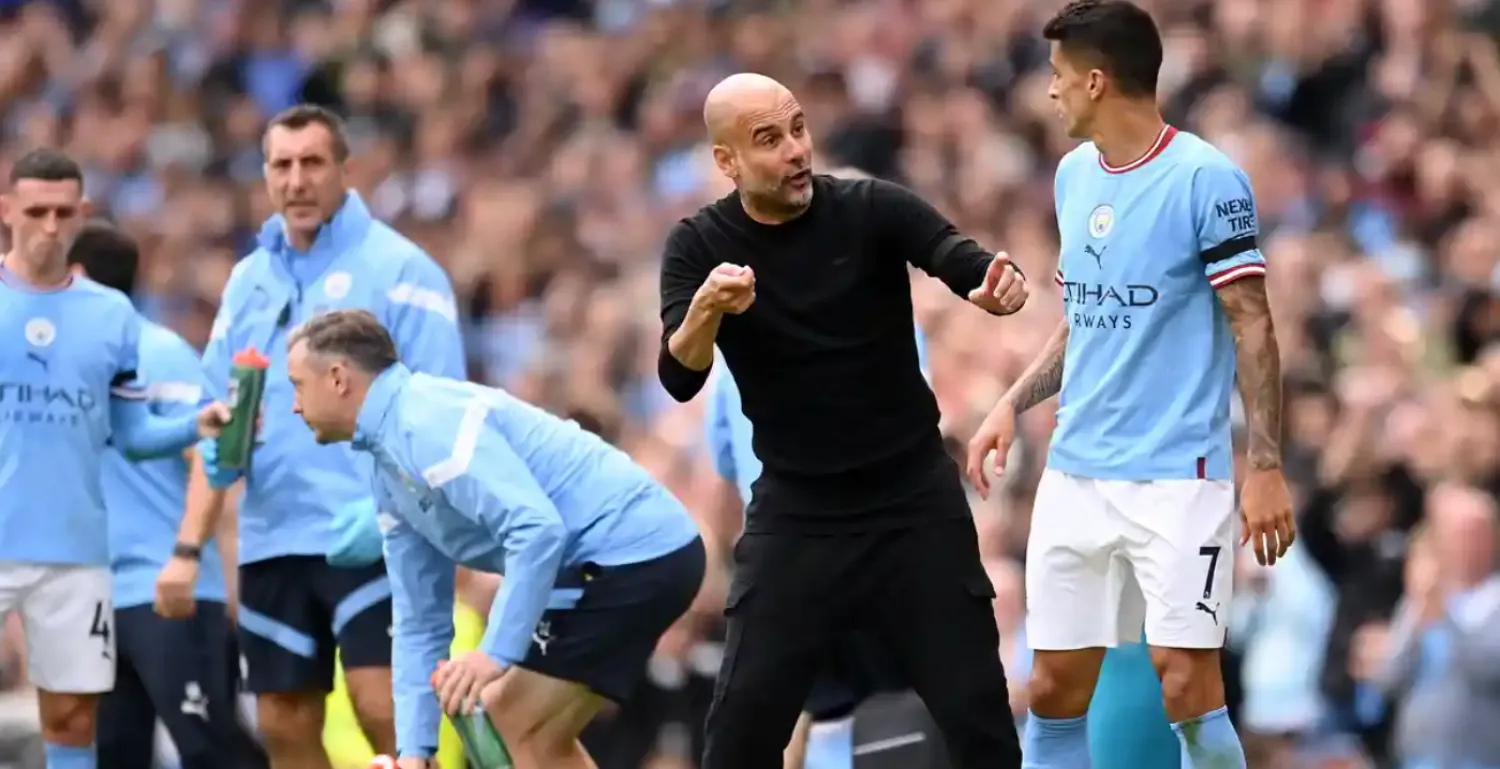 Pep Guardiola gives instructions to João Cancelo during Manchester City’s derby day mauling of United. Photograph: Michael Regan/Getty Images
