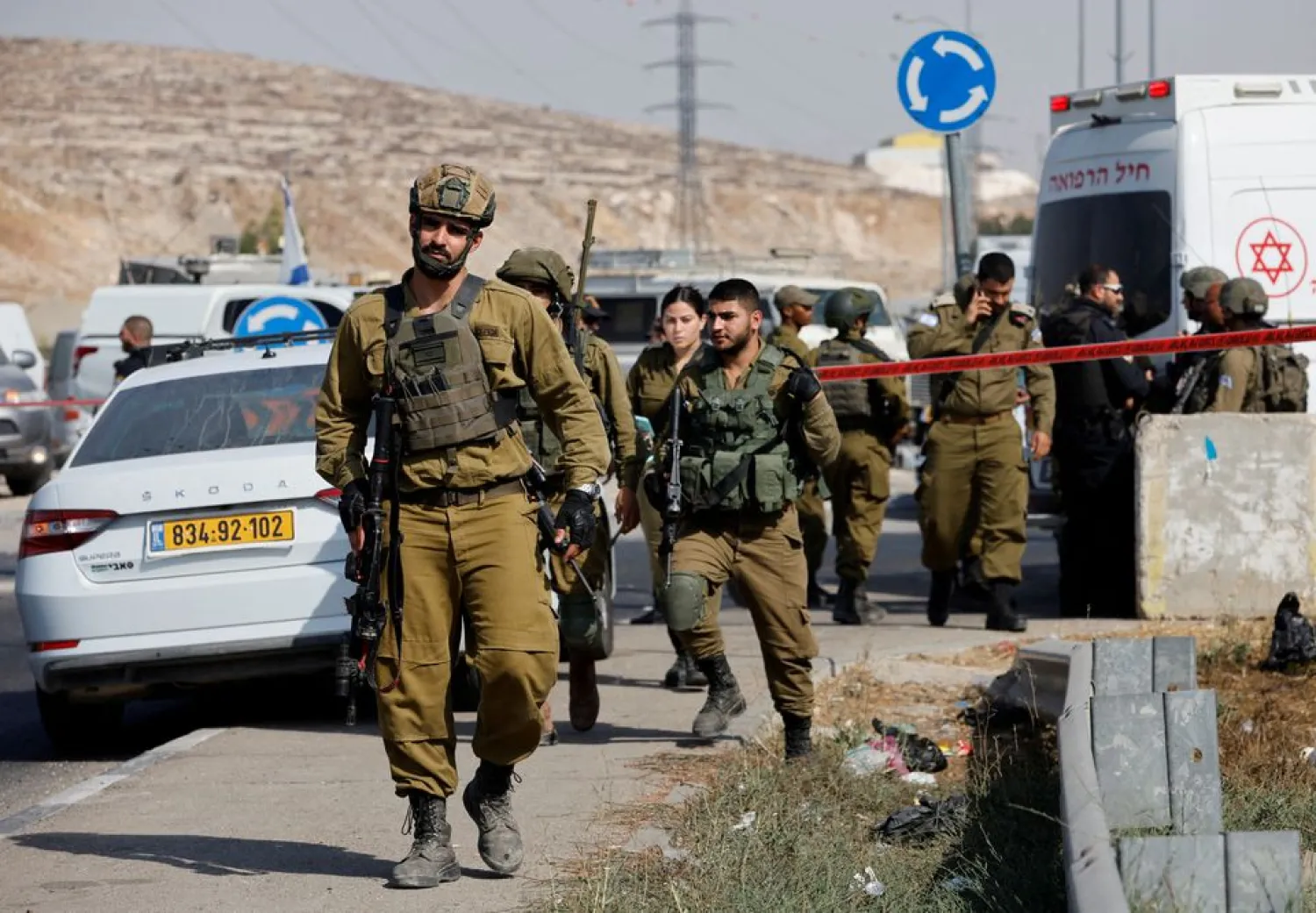 Israeli troops walk near Hebron, in the Israeli occupied West Bank, September 2, 2022. REUTERS/Mussa Issa Qawasma