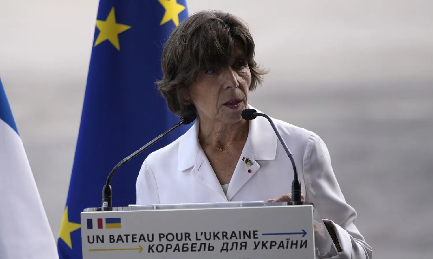French Foreign Minister Catherine Colonna speaks after visiting the cargo ship for Ukraine Wednesday, Sept. 28, 2022 in the port of Marseille, southern France. (AP)