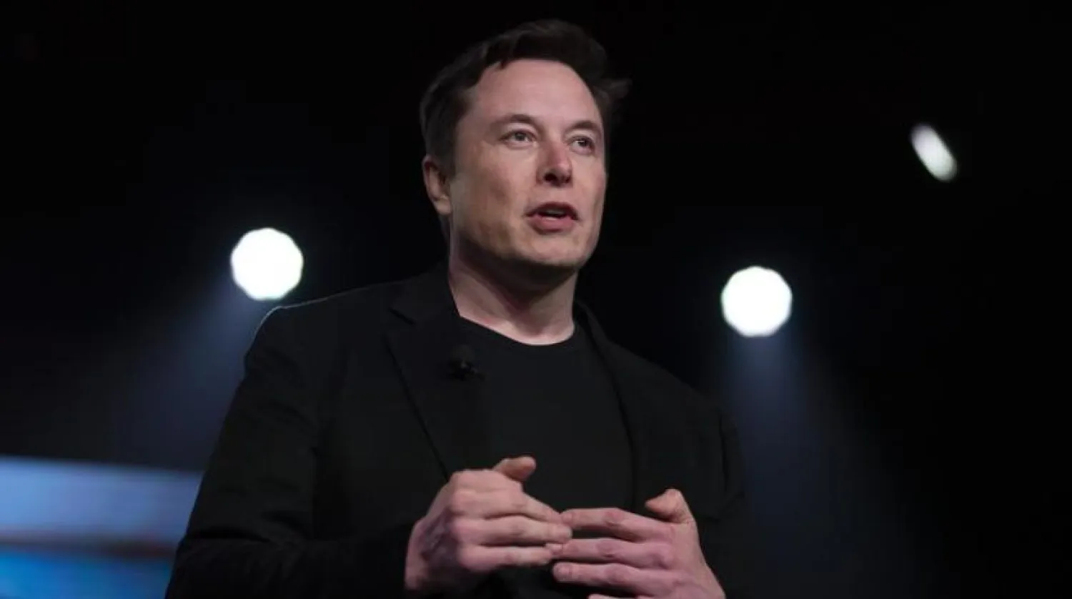 FILE - In this March 14, 2019, file photo, Tesla CEO Elon Musk speaks before unveiling the Model Y at the company's design studio in Hawthorne, Calif. (AP Photo/Jae C. Hong, File)
