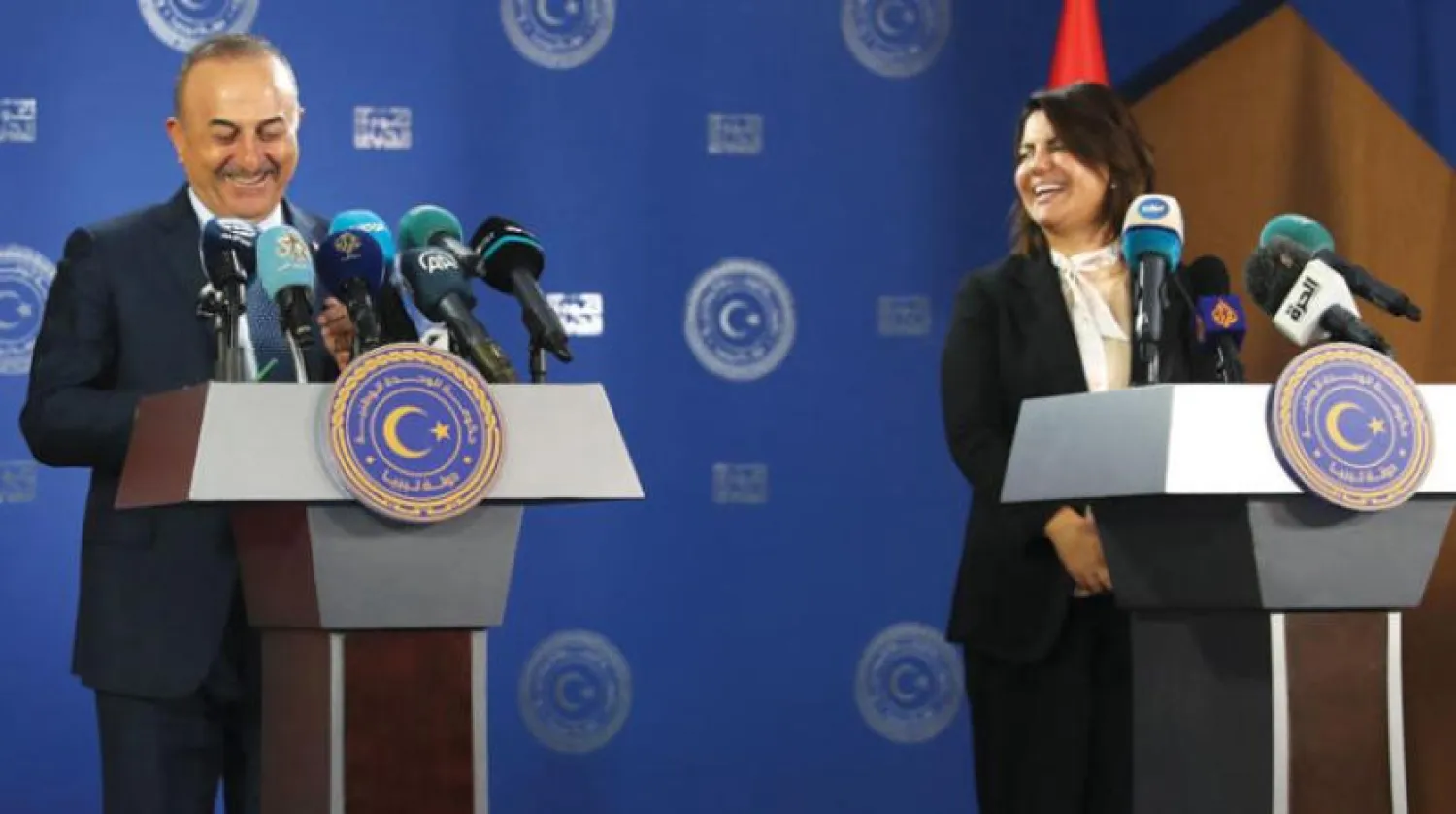 Libya Dışişleri Bakanı Necla Menkuş ve Türk mevkdaşı Mevlüt Çavuşoğlu Trablus’ta düzenlenen basın toplantısında (AFP)