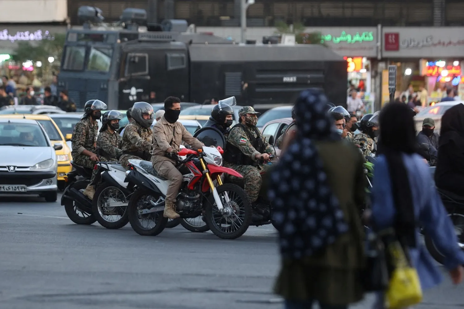 Riot police officers ride motorcycles in a street in Tehran, Iran, October 3, 2022. WANA (West Asia News Agency) via Reuters