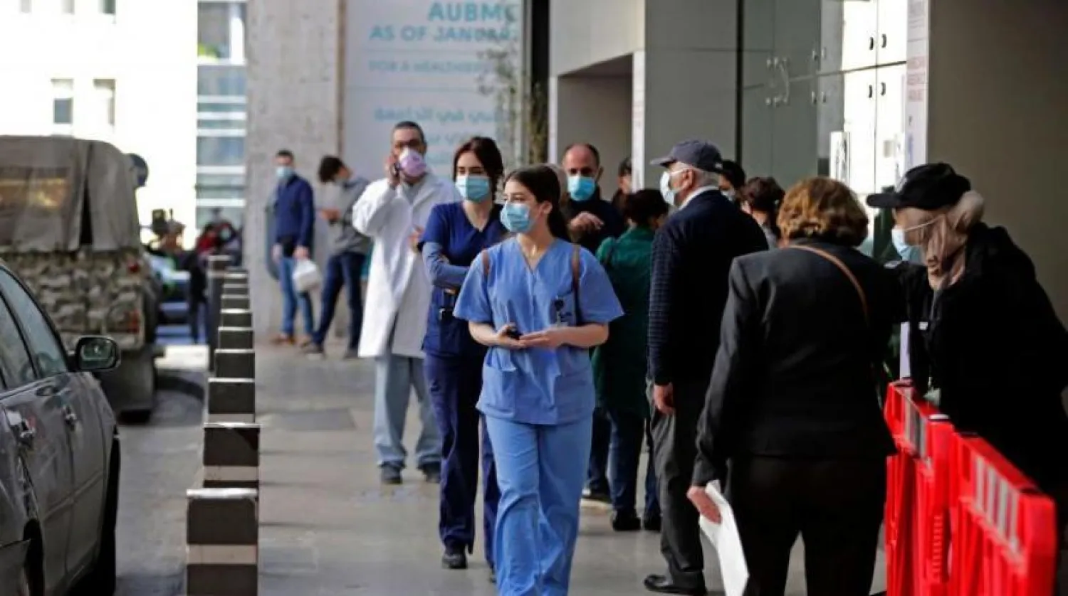 FILE: People walk outside a hospital in Beirut. AFP

