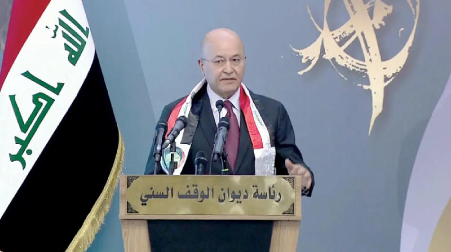 الرئيس صالح يلقي كلمته لدى مشاركته في احتفالية بمناسبة المولد النبوي الشريف في الأعظمية أمس (الرئاسة العراقية)